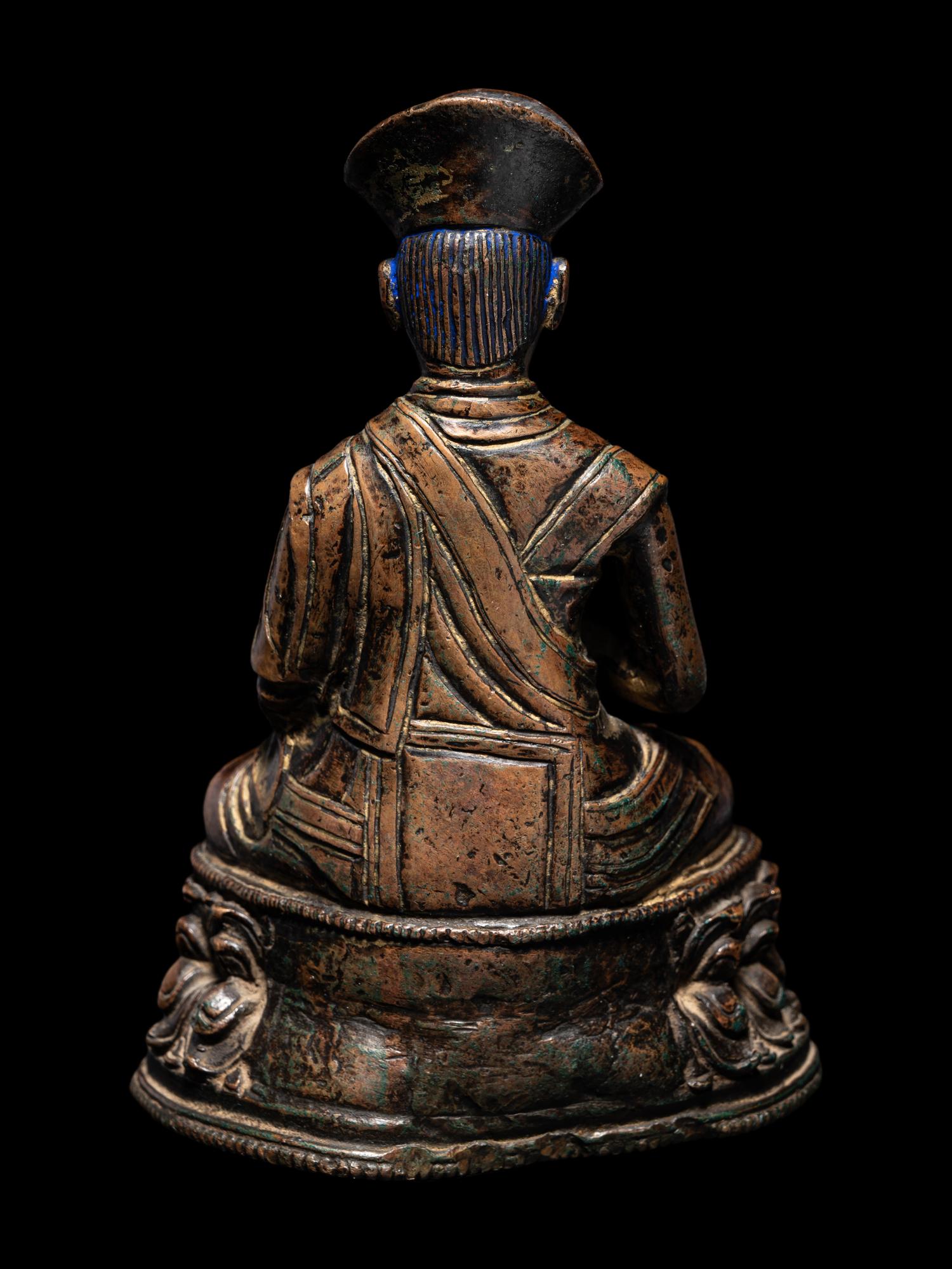 A Tibetan Bronze Figure of a Lama