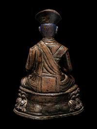 A Tibetan Bronze Figure of a Lama