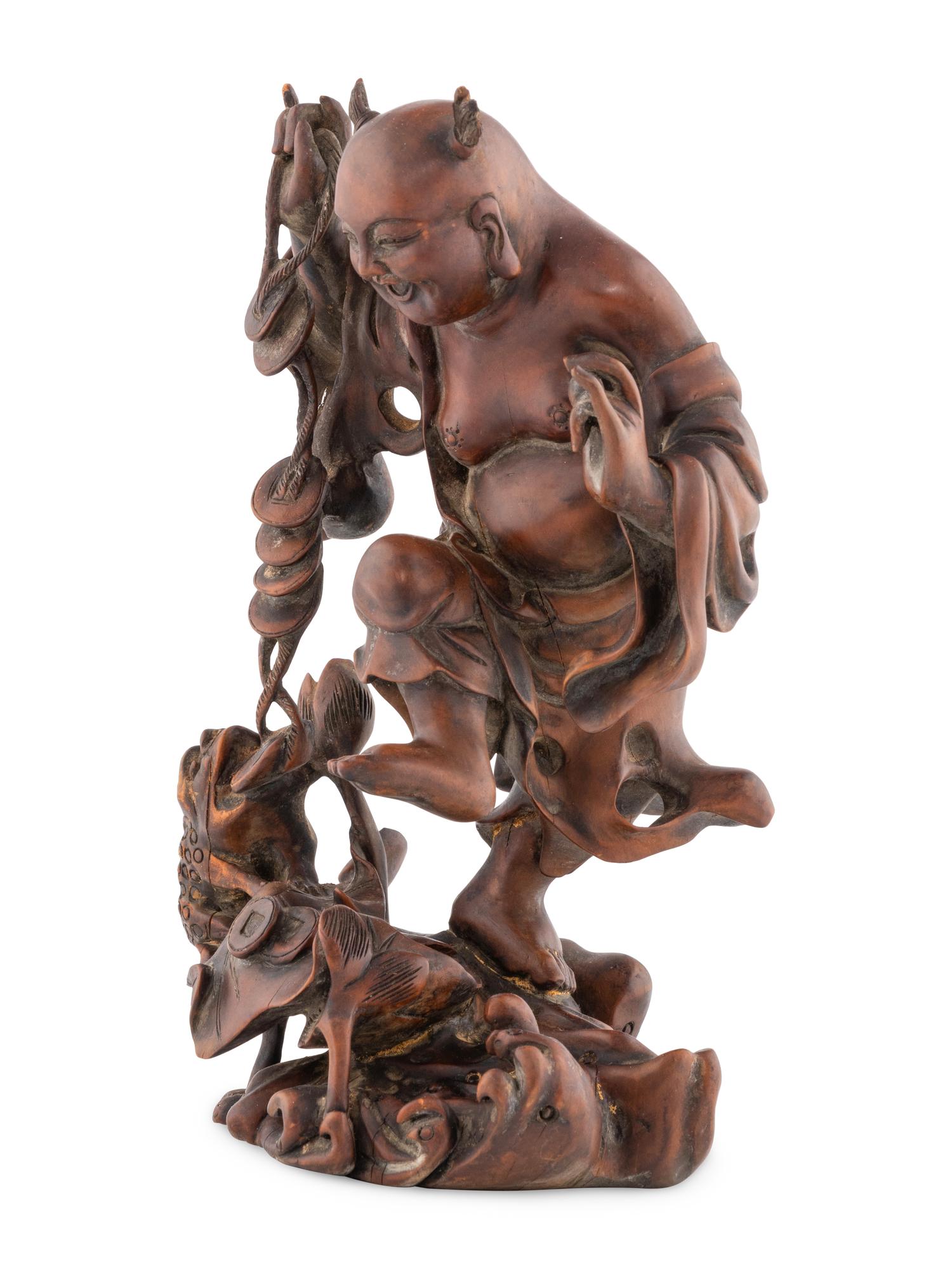 A Chinese Wood Figural Group of Liuhai and Three-Legged Toad