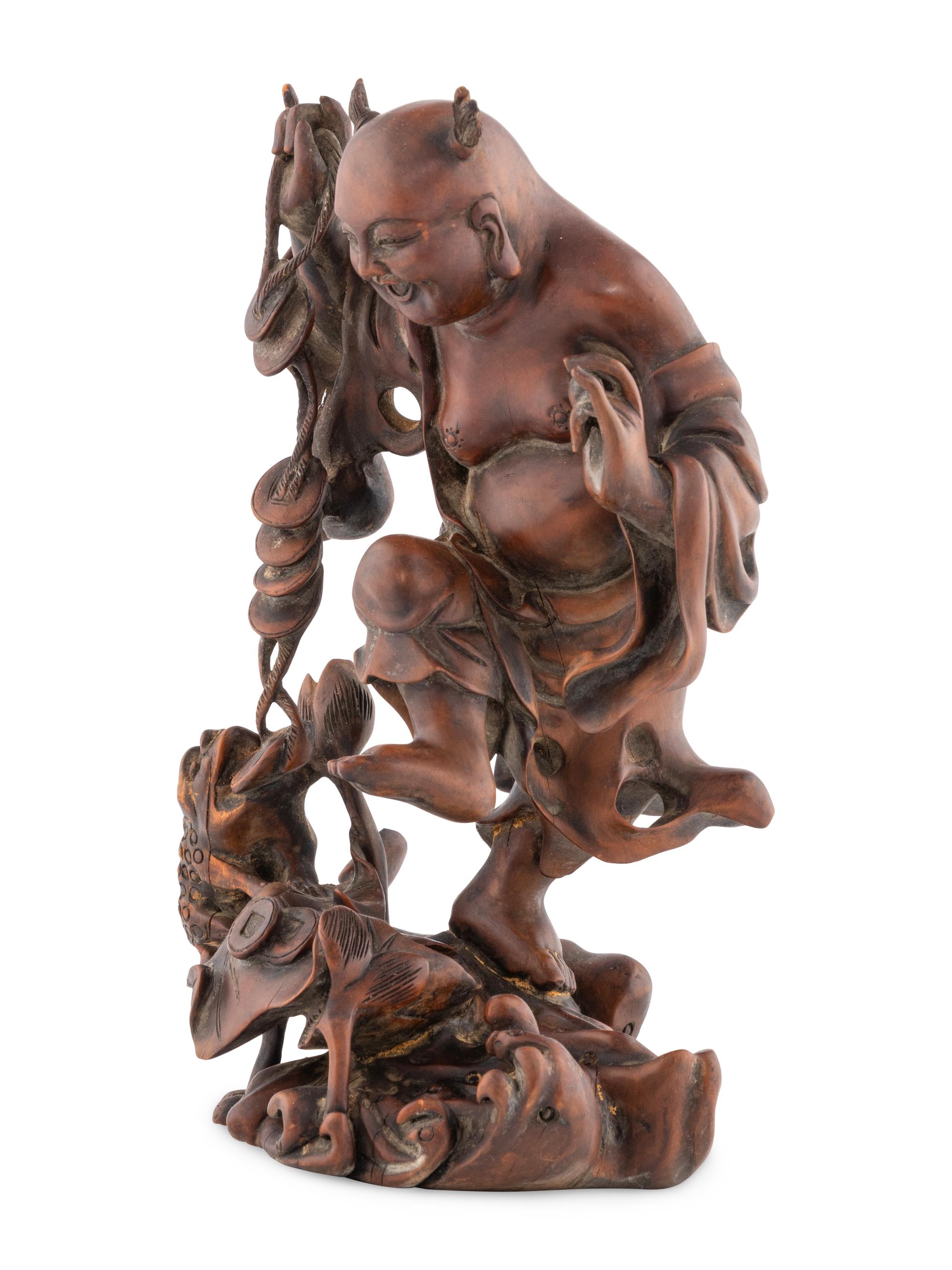 A Chinese Wood Figural Group of Liuhai and Three-Legged Toad