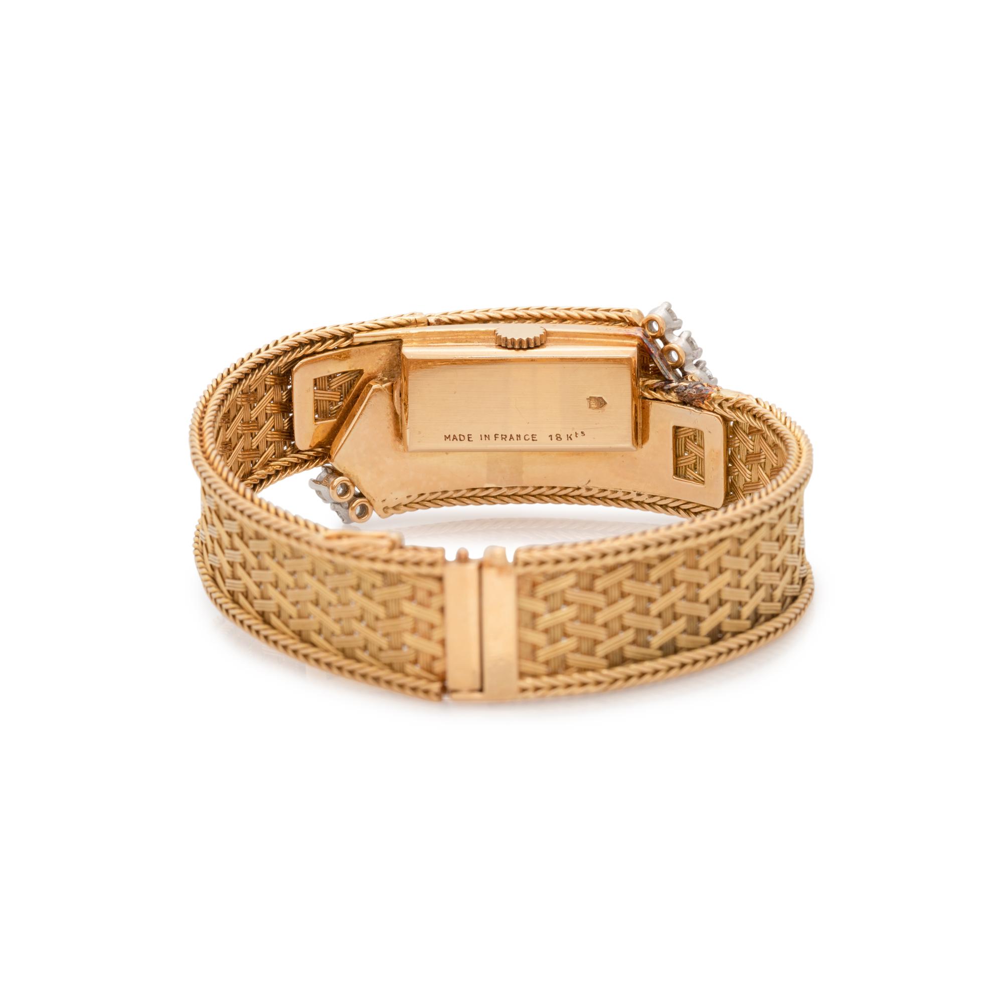 UTI WATCH CO., 18K YELLOW GOLD AND DIAMOND SURPRISE WRISTWATCH