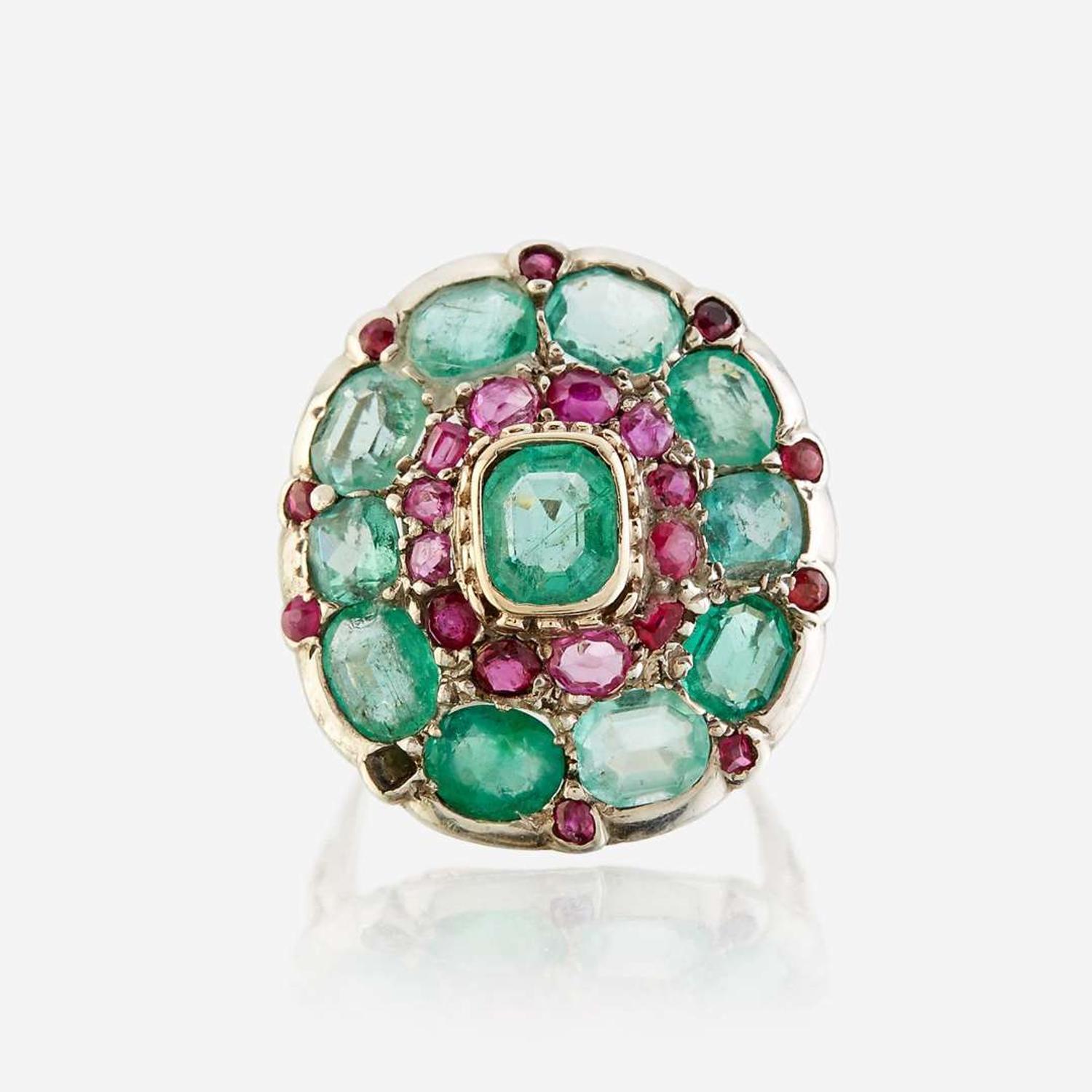 A green beryl, ruby, and ten karat white gold ring