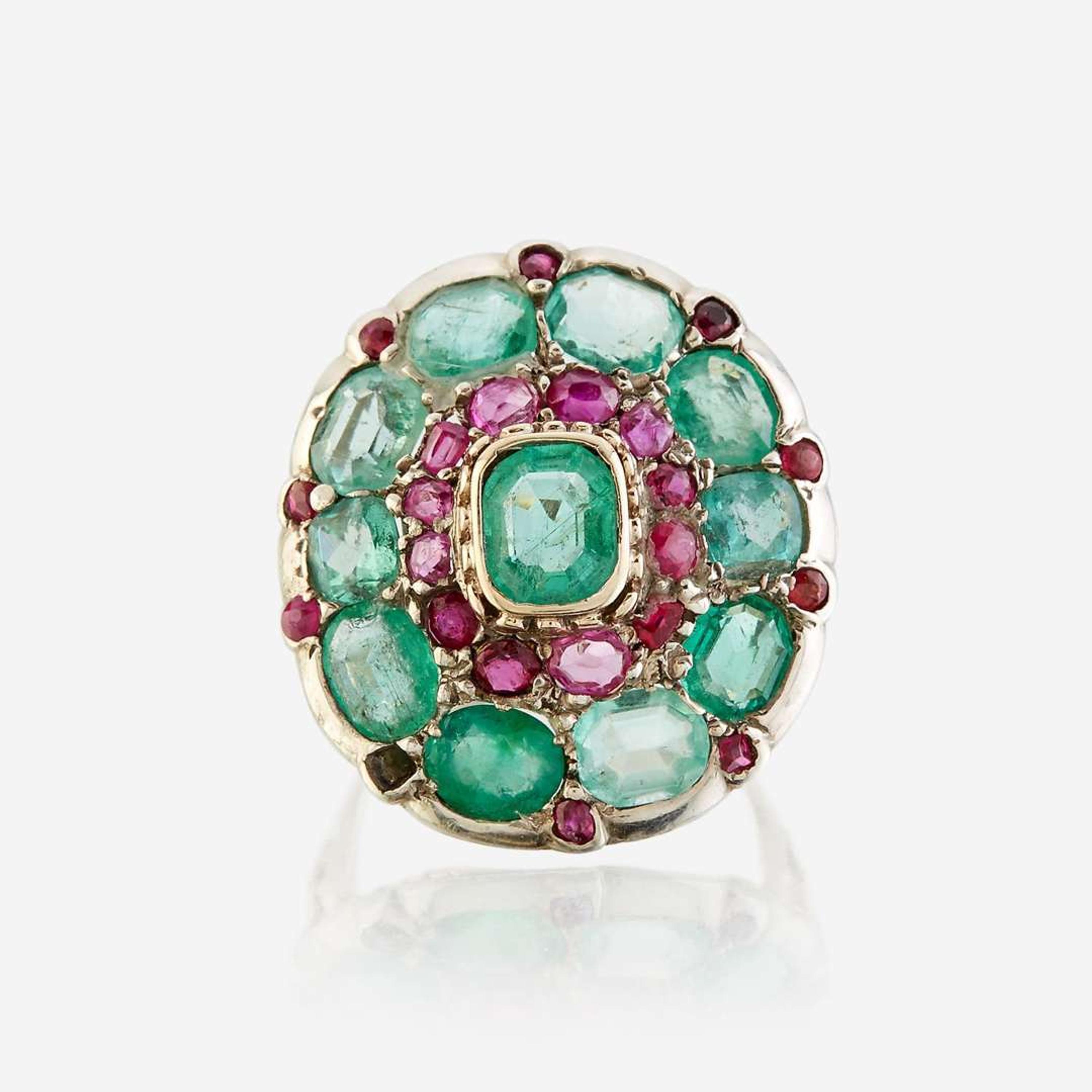 A green beryl, ruby, and ten karat white gold ring