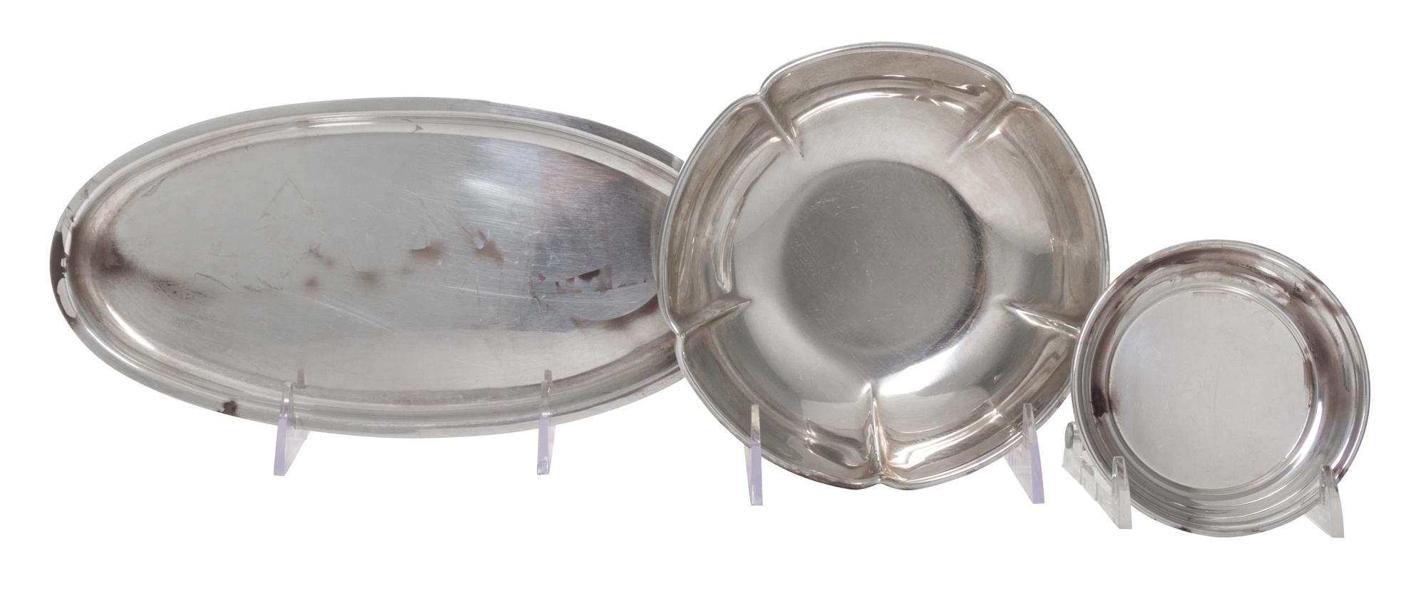 Three American Silver Articles, The Randahl Shop, Chicago, IL, comprising a floriform circular bowl, an elongated oval tray and a circu