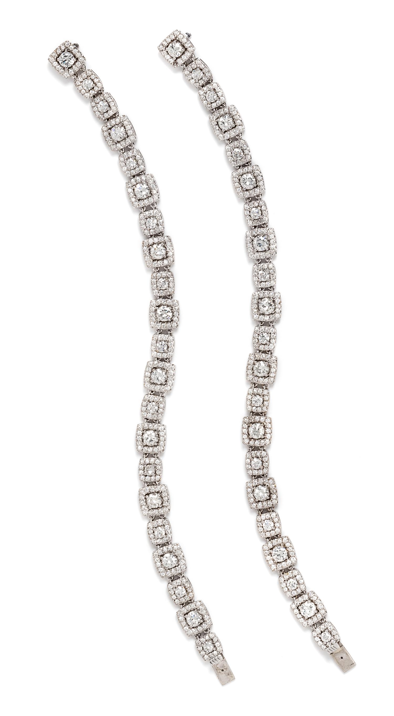 A Pair of White Gold and Diamond Convertible Bracelets, 27.90 dwts.