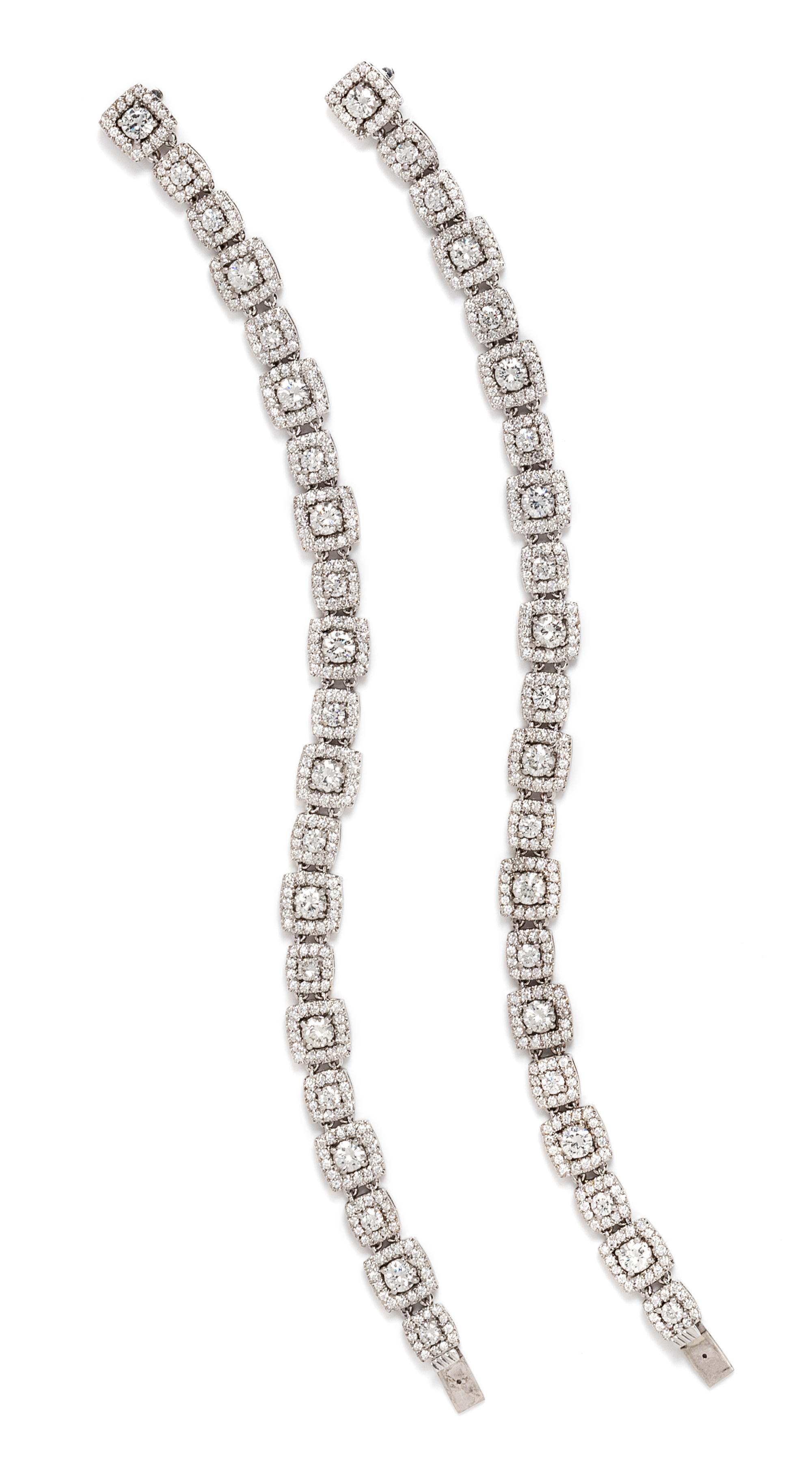 A Pair of White Gold and Diamond Convertible Bracelets, 27.90 dwts.