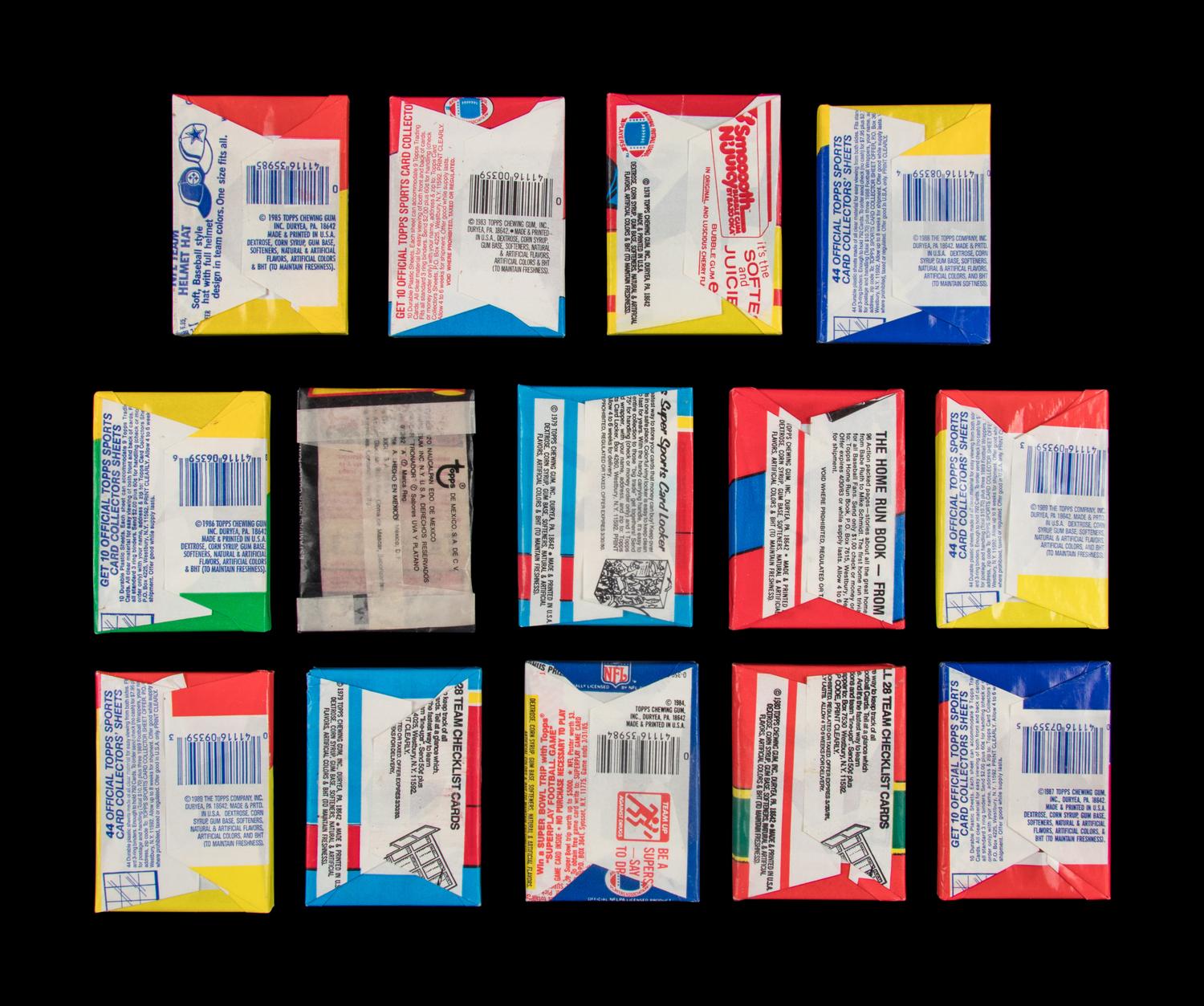 A Large Collection of Unopened and Sealed 1970s and 1980s Topps Football Wax Packs