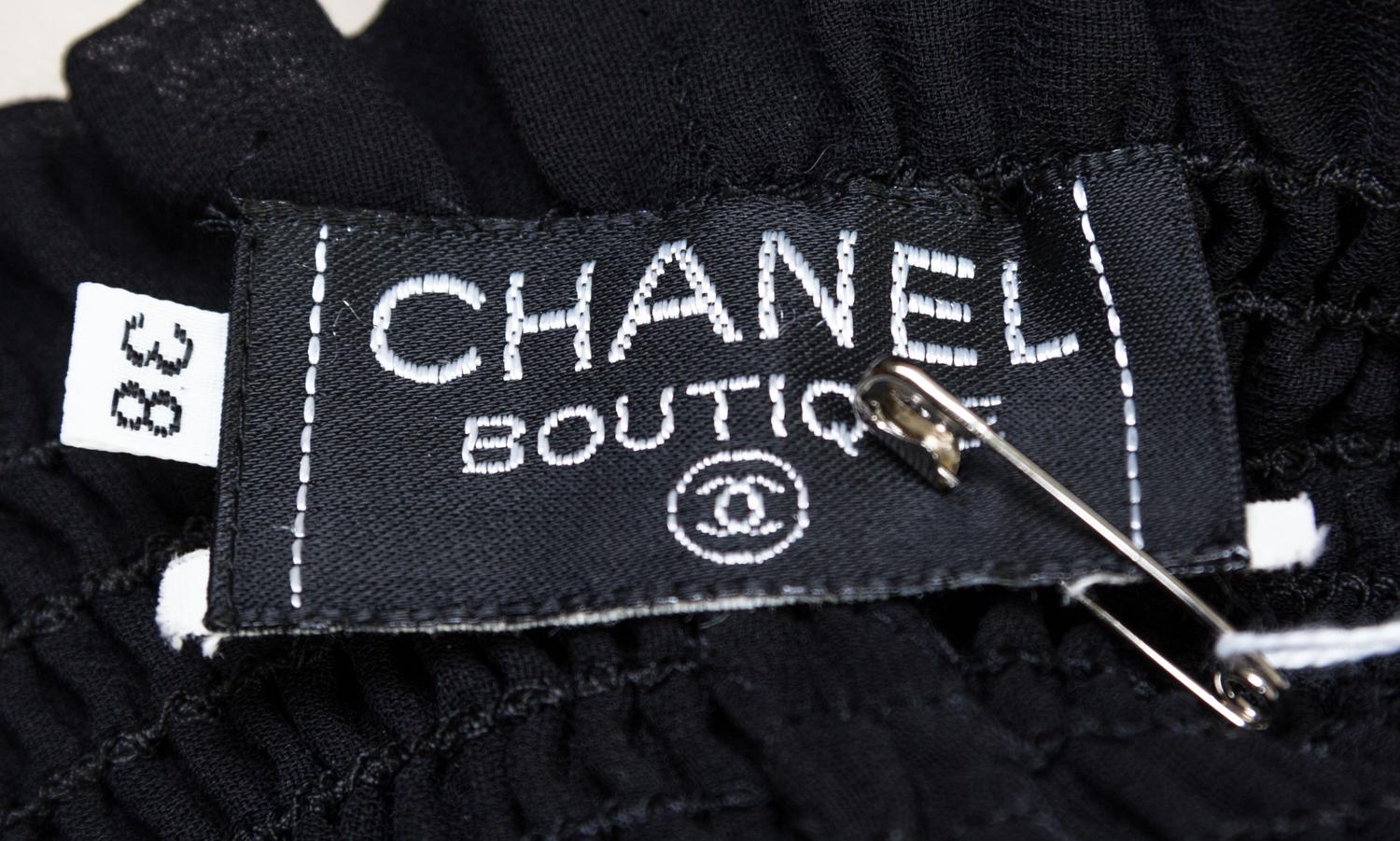 A Chanel Black Swimsuit Ensemble, Size 40, pant size 38.