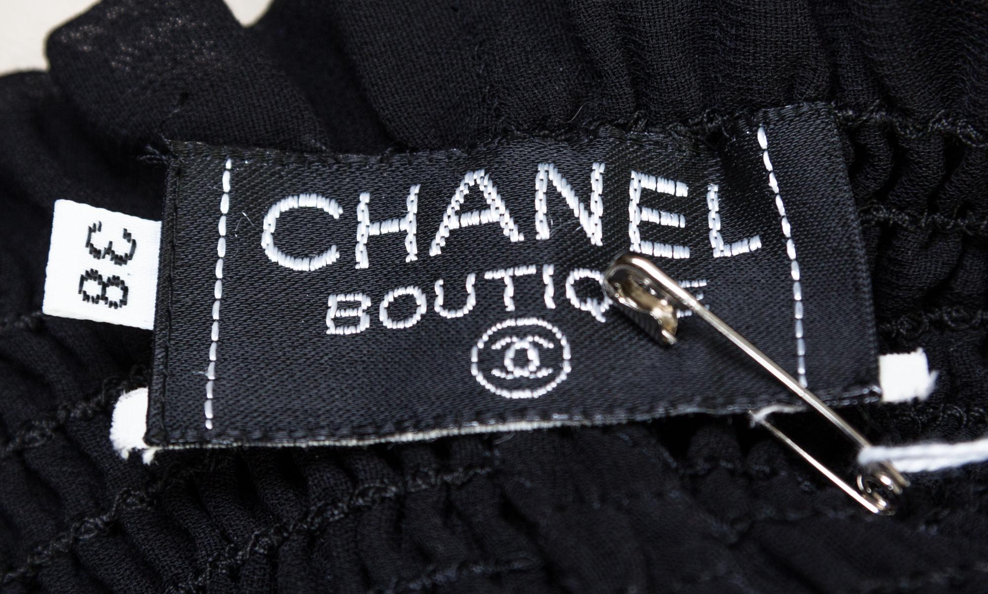 A Chanel Black Swimsuit Ensemble, Size 40, pant size 38.