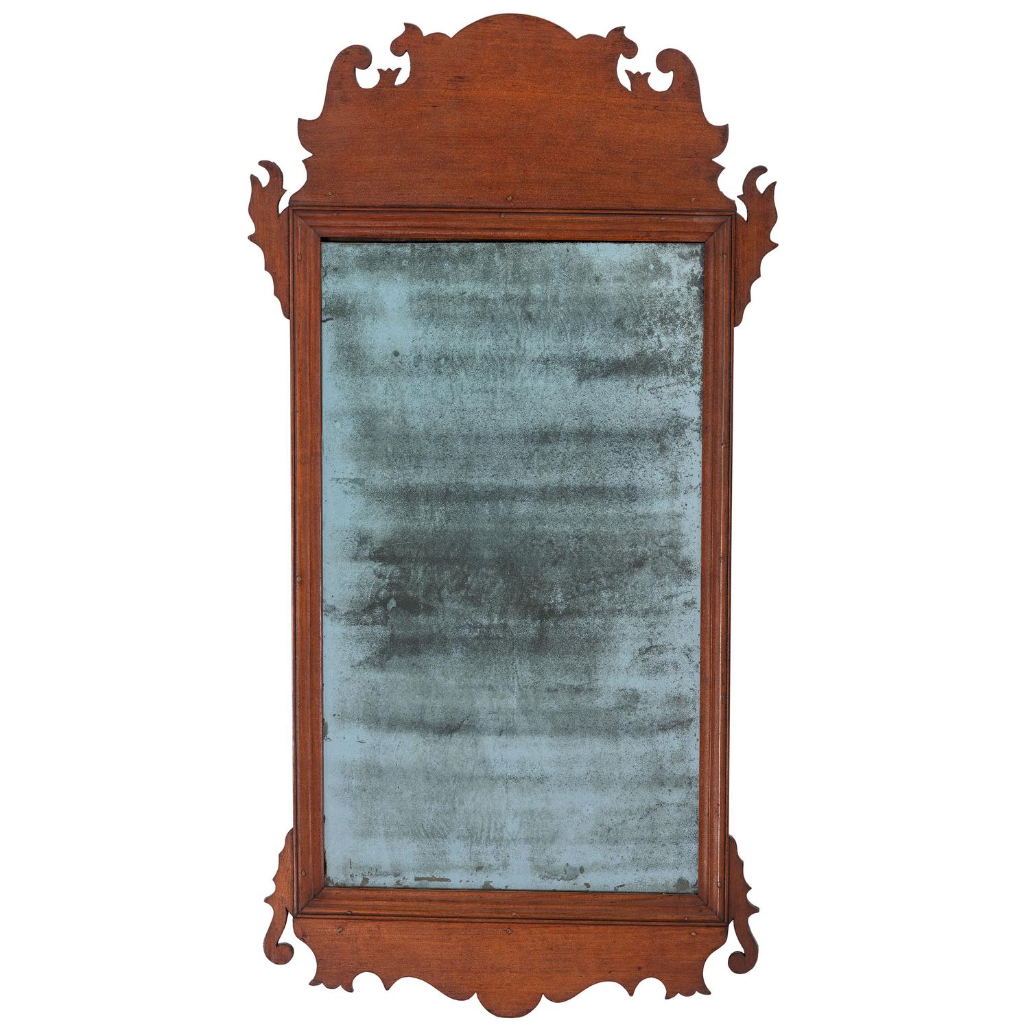 A Chippendale Style Carved Cherrywood Looking Glass