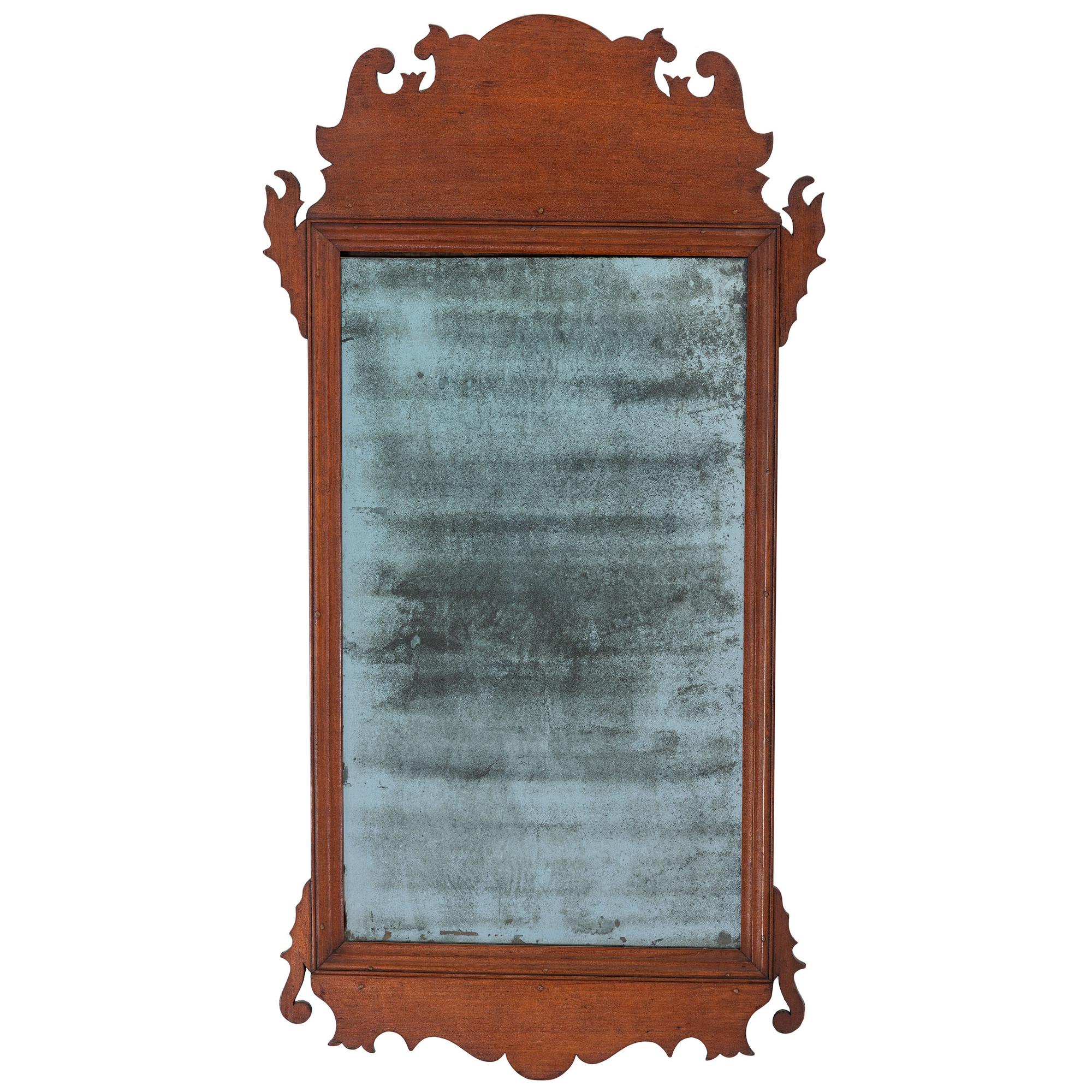 A Chippendale Style Carved Cherrywood Looking Glass