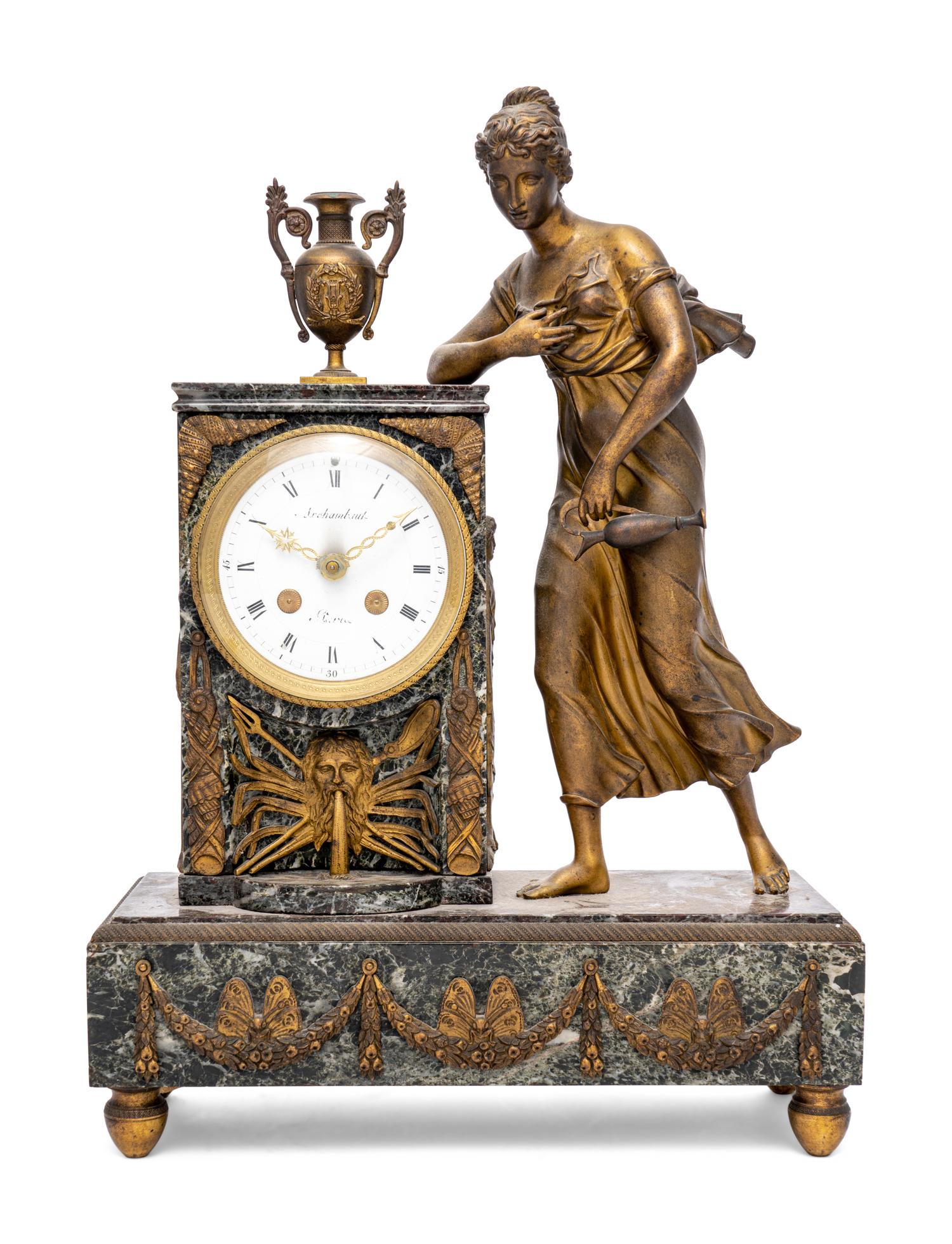 An Empire Style Gilt Metal and Marble Figural Mantel Clock