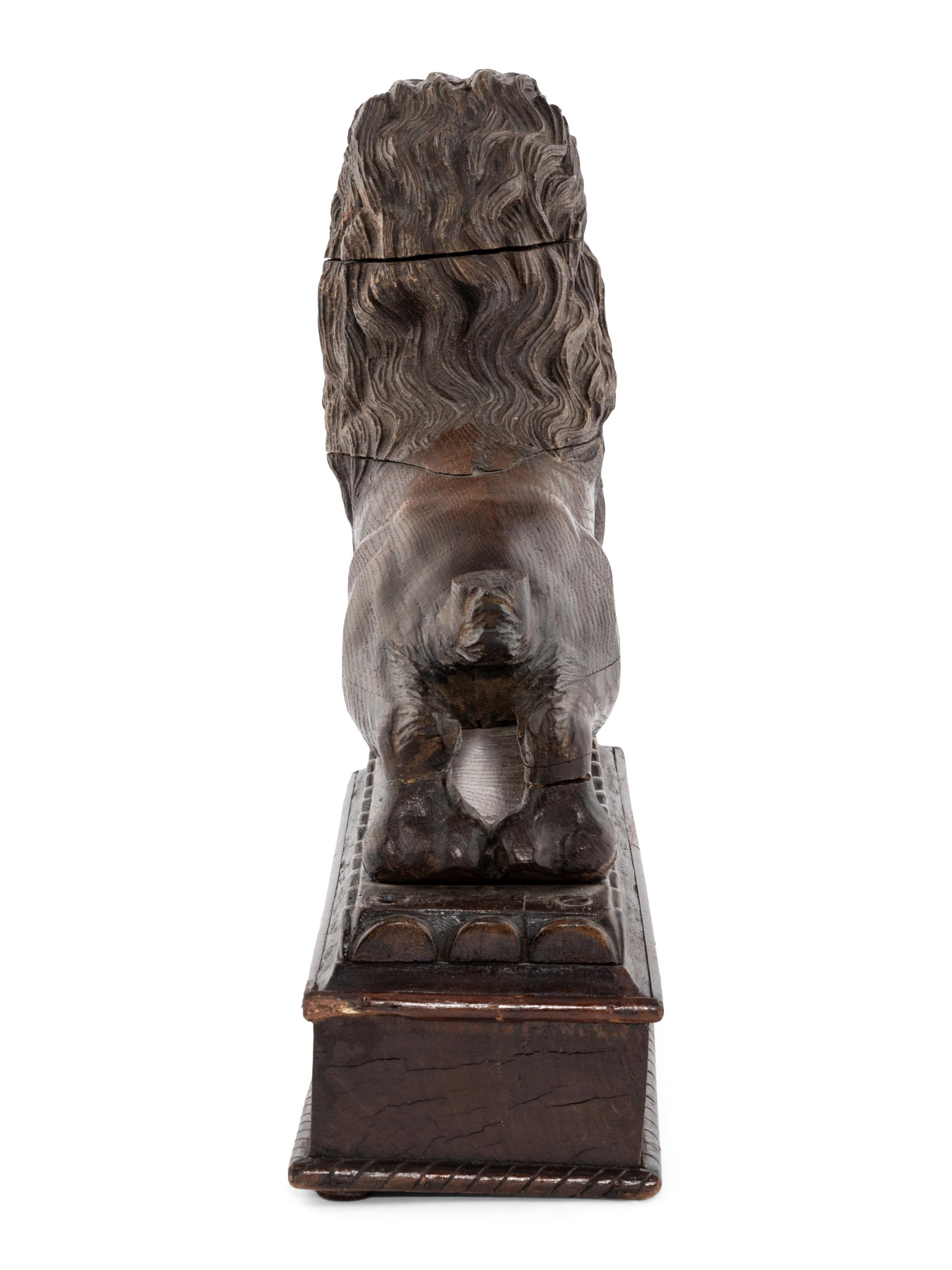 A Continental Carved Oak Lion