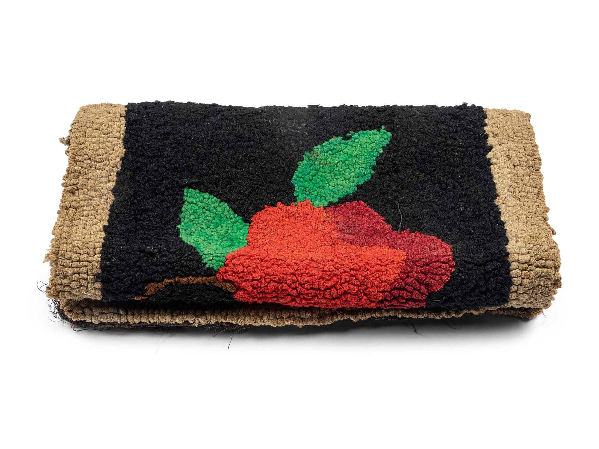 A Hooked Rug with Rose and Daisies