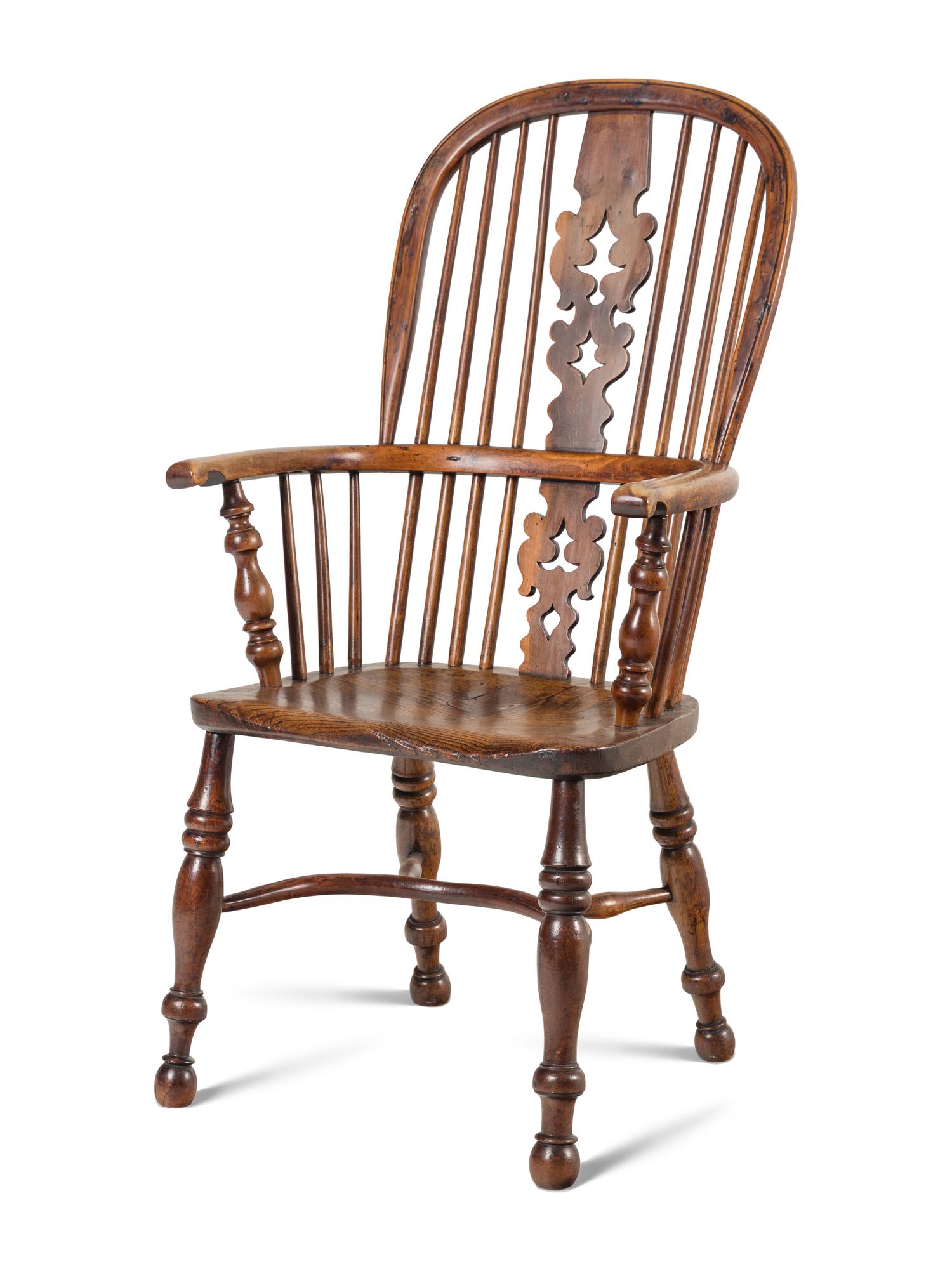An Assembled Set of Nine Yew, Elm and Beechwood Windsor Armchairs