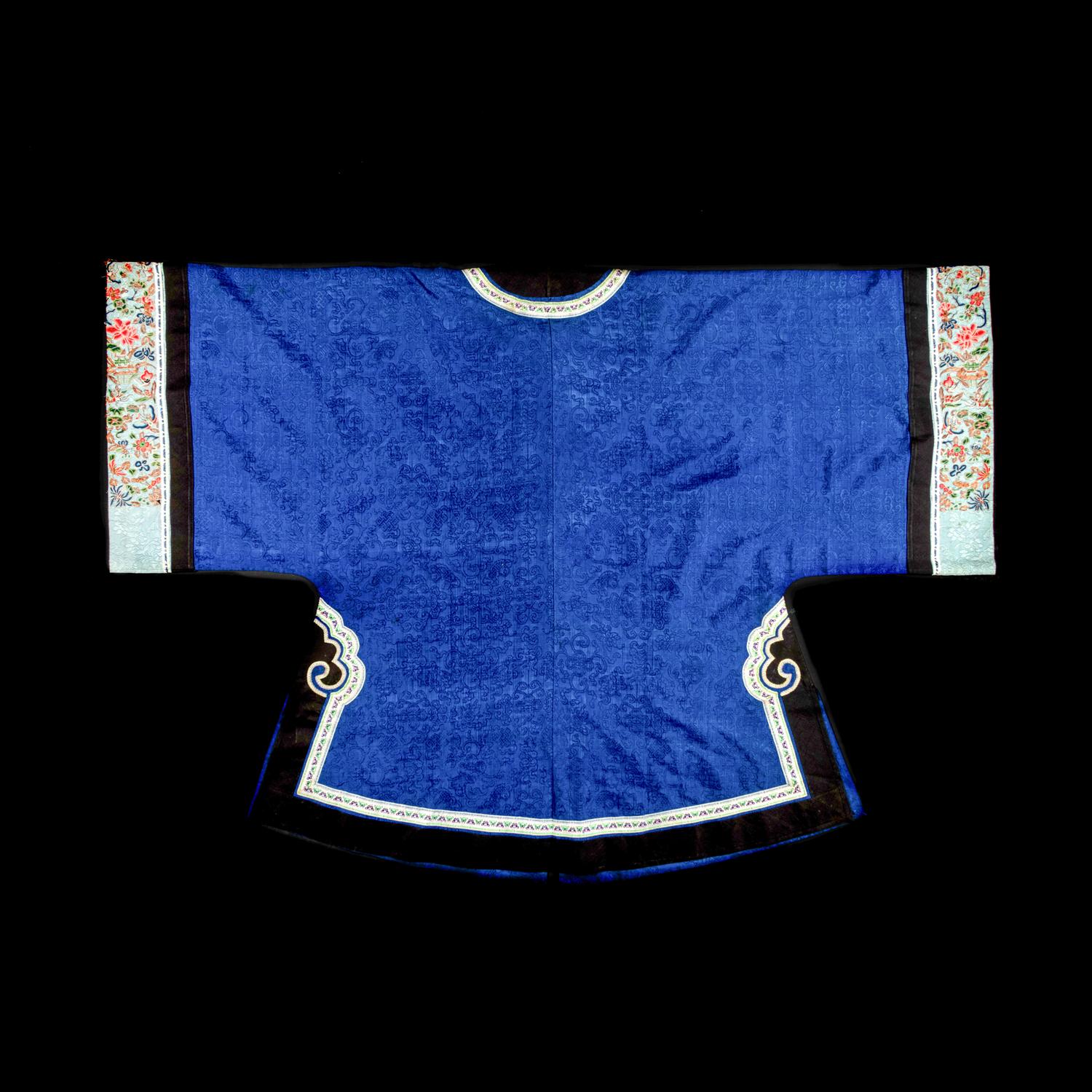 Two Chinese Blue Ground Silk Robes, Late Qing Dynasty 清晚期 藍地盤金繡游龍瑞獸纹道袍及藍地織錦女褂