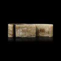 A Chinese Celadon and Black Jade 'Chilong' Sword Scabbard, Jianzhi Qing Dynasty or Earlier 清或更早 青玉提油雕螭龍劍璏