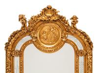 A Pair of Louis XV Style Gilt and Engraved Mirrors