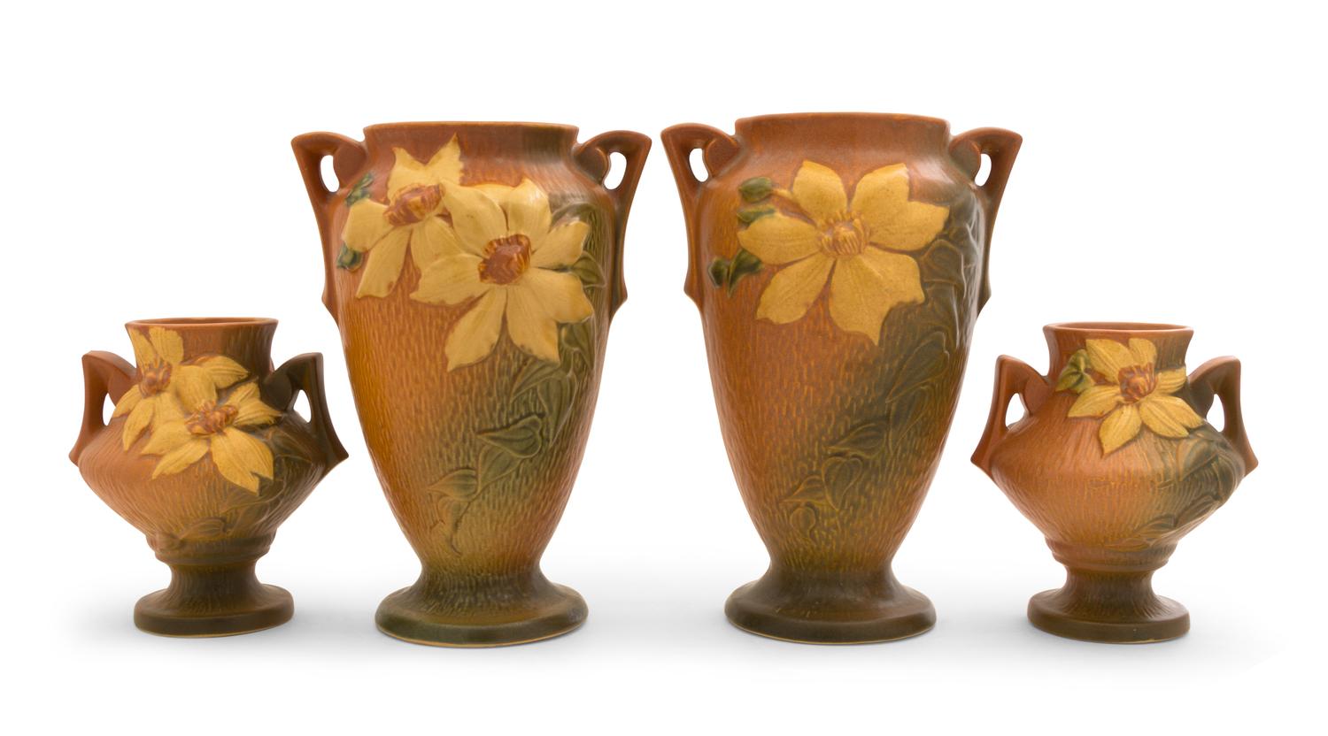 Two Pairs of Roseville Clematis Pottery Vases Height of first 10 1/4 inches, second 6 1/4 inches.