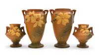 Two Pairs of Roseville Clematis Pottery Vases Height of first 10 1/4 inches, second 6 1/4 inches.