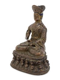 A Tibetan Bronze Figure of a Lama