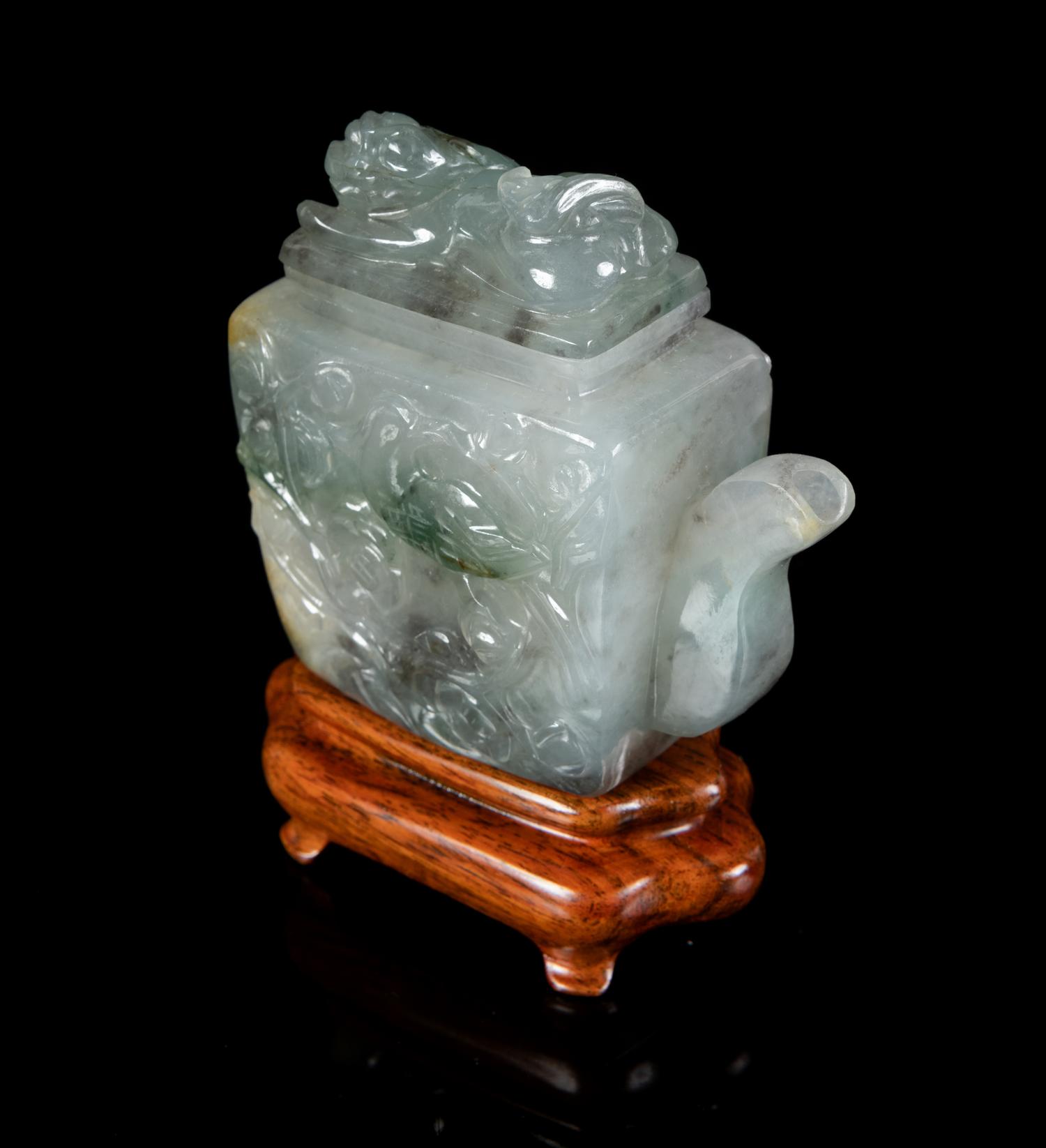 A Chinese Green and White Jadeite Teapot