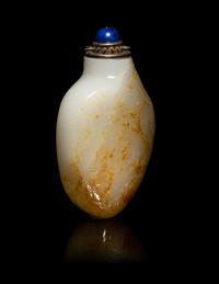 A Chinese Russet and White Jade 'Fishing' Snuff Bottle