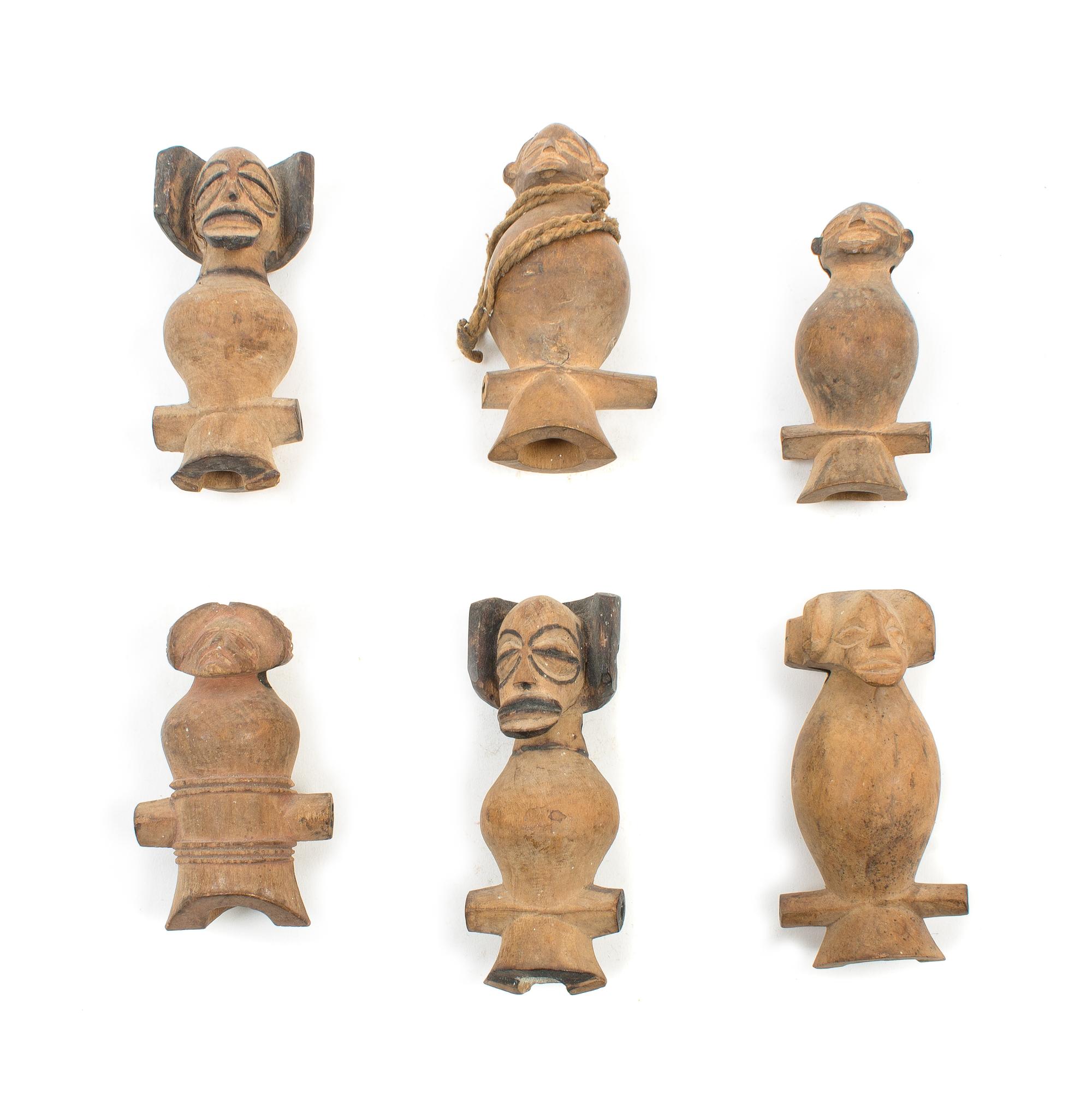 Six Chokwe Wood Whistles Height of largest example 3 3/8 inches. — FIRST QUARTER 20TH CENTURY