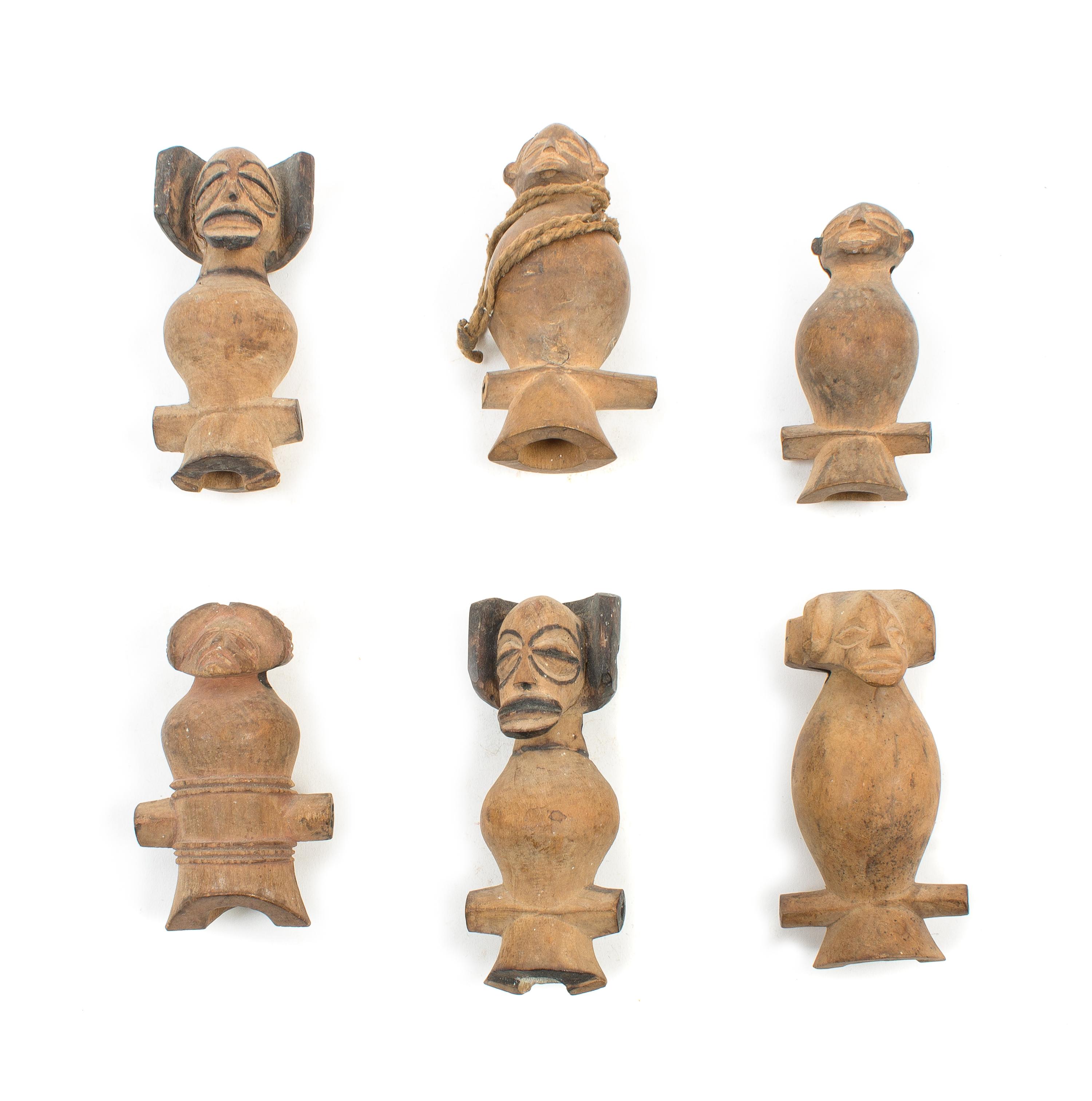 Six Chokwe Wood Whistles Height of largest example 3 3/8 inches. — FIRST QUARTER 20TH CENTURY