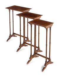 A Set of Three George III Style Satinwood and Yew Wood Nesting Tables