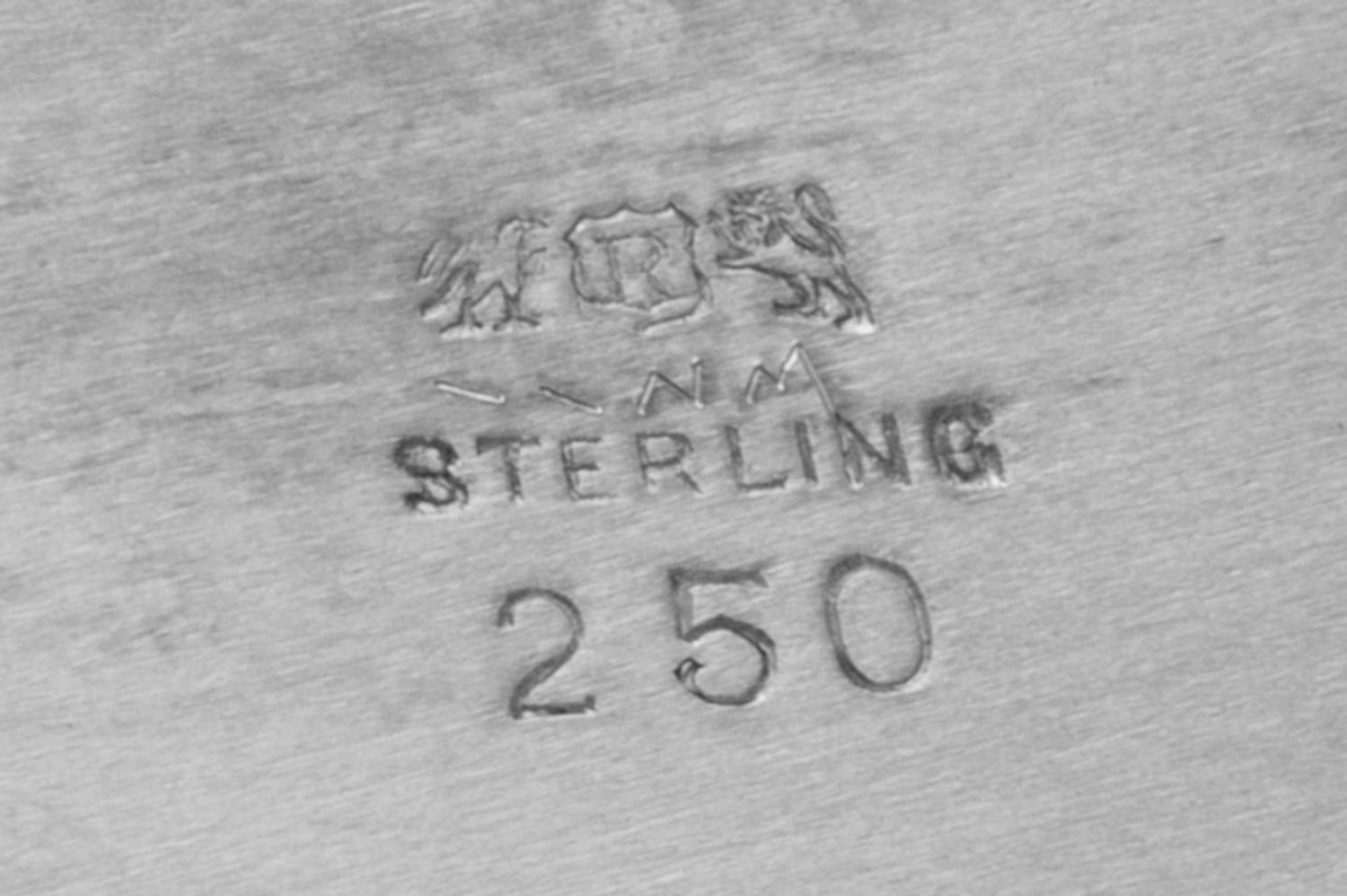 An American Silver Bowl, Reed & Barton, Taunton, MA, of oval form, having a scallped border and centered with the engraved monogram GSV
