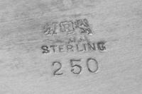 An American Silver Bowl, Reed & Barton, Taunton, MA, of oval form, having a scallped border and centered with the engraved monogram GSV
