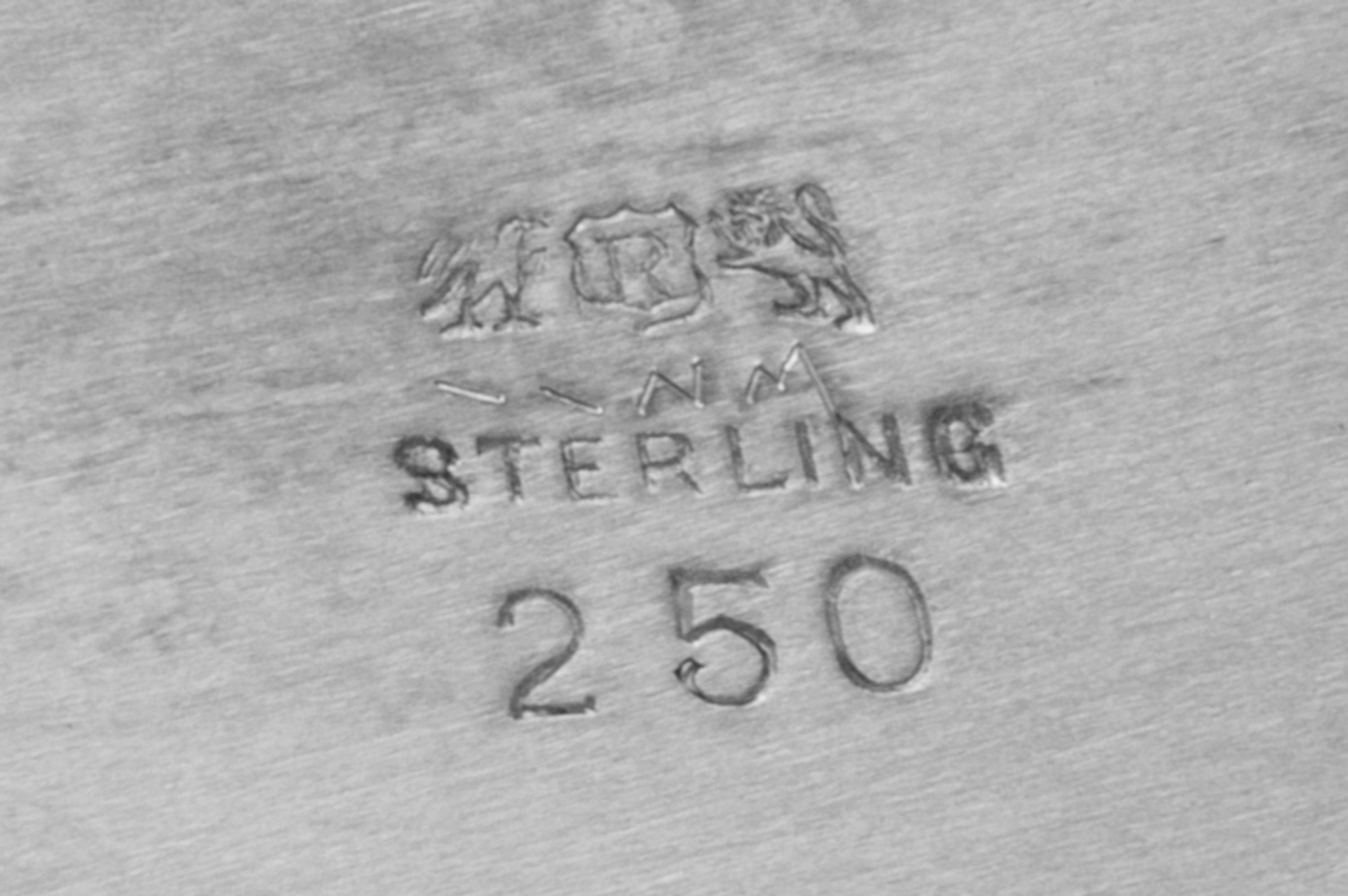 An American Silver Bowl, Reed & Barton, Taunton, MA, of oval form, having a scallped border and centered with the engraved monogram GSV