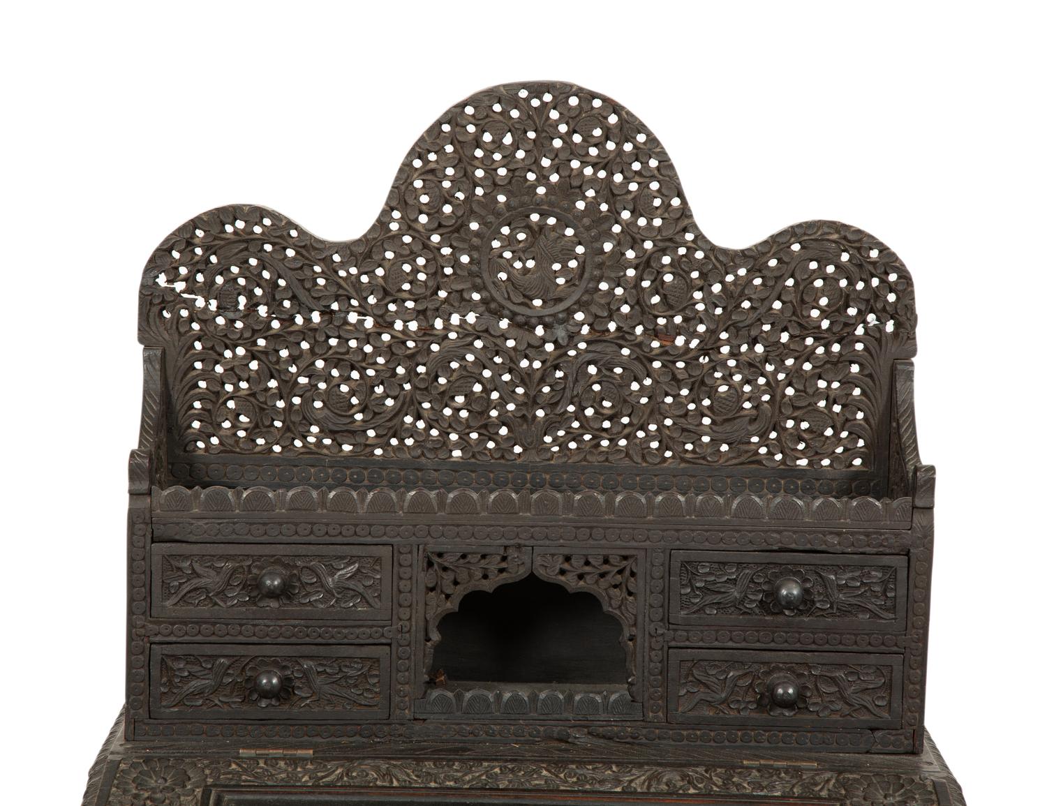 An Anglo-Burmese Carved Teak Davenport Desk