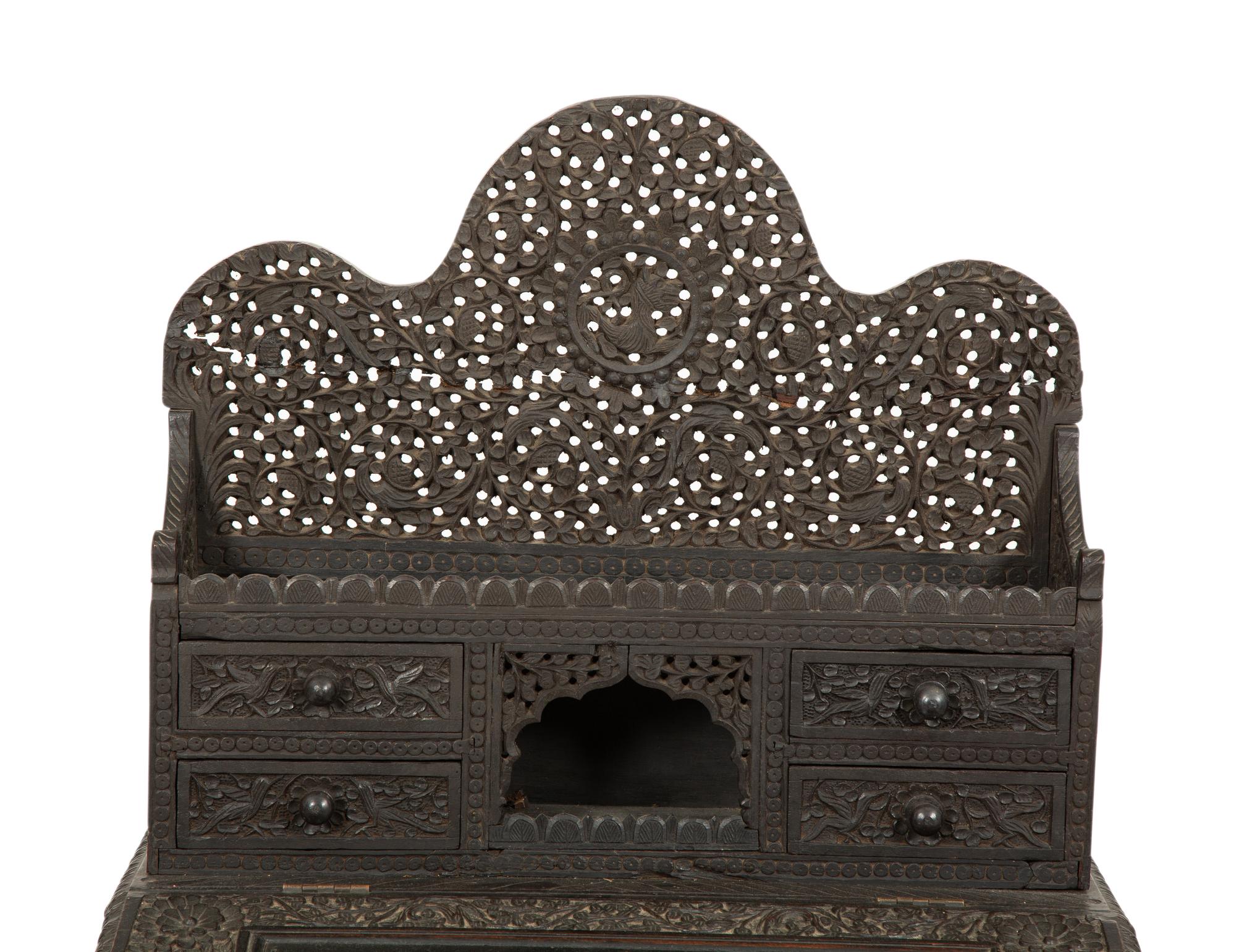 An Anglo-Burmese Carved Teak Davenport Desk