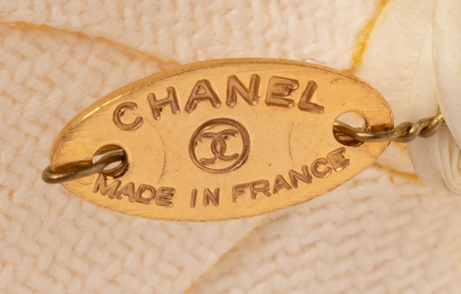 Four Chanel Accessories: Three Ear Clips & One Camellia Pin, 1980-90s