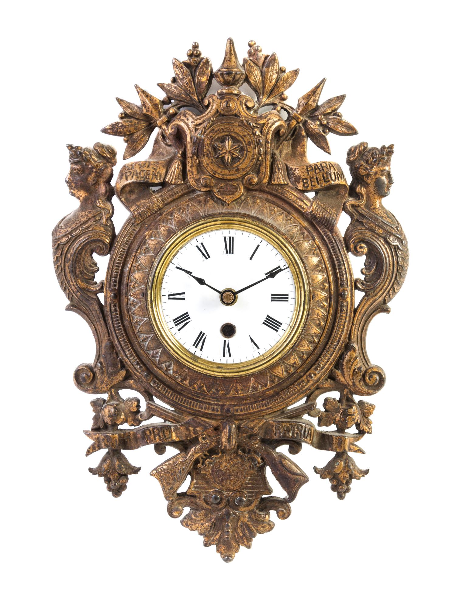 A Continental Cast Metal Wall Clock Height 14 x width 10 inches. — 19TH/20TH CENTURY