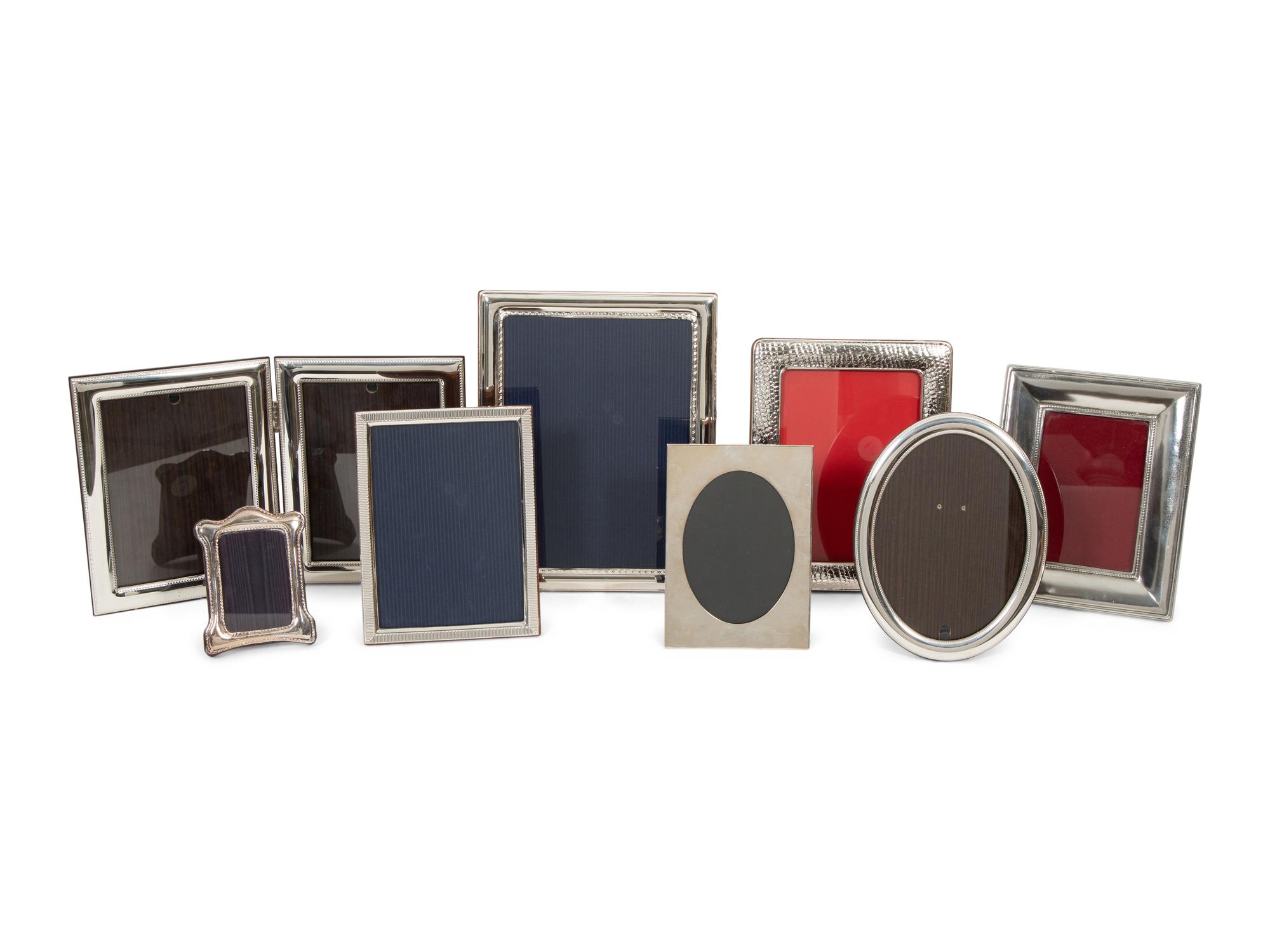 Eight Silvered Metal Picture Frames