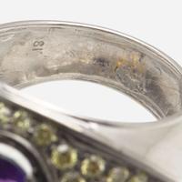 An Amethyst, Diamond, and Yellow Diamond Ring
