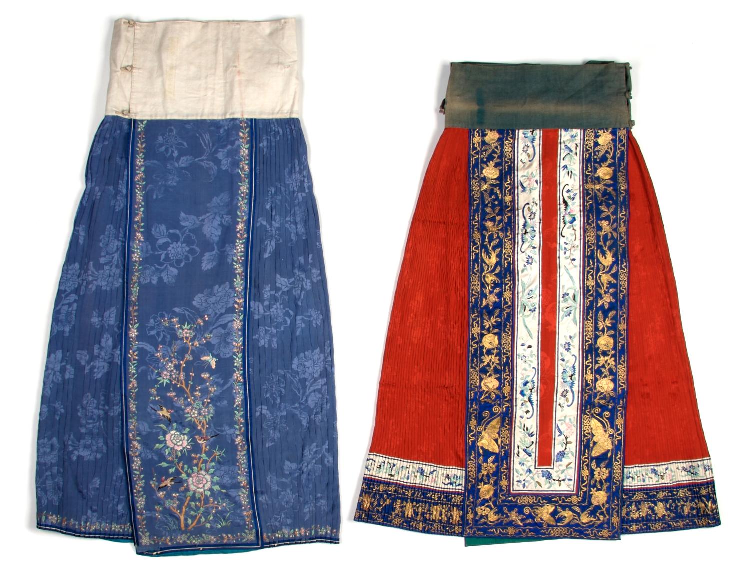 A Group of Two Chinese Pleated Silk Skirts, Length of longest 39 inches.