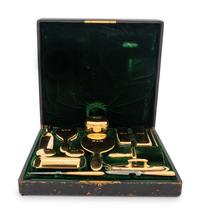 A Tiffany and Co. 18-Karat Yellow-Gold Fourteen-Piece Dresser Set