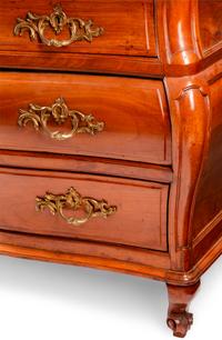 A French Provincial Walnut Bombe Commode