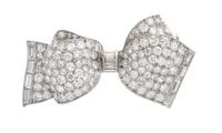 A Platinum and Diamond Bow Brooch, 4.40 dwts.