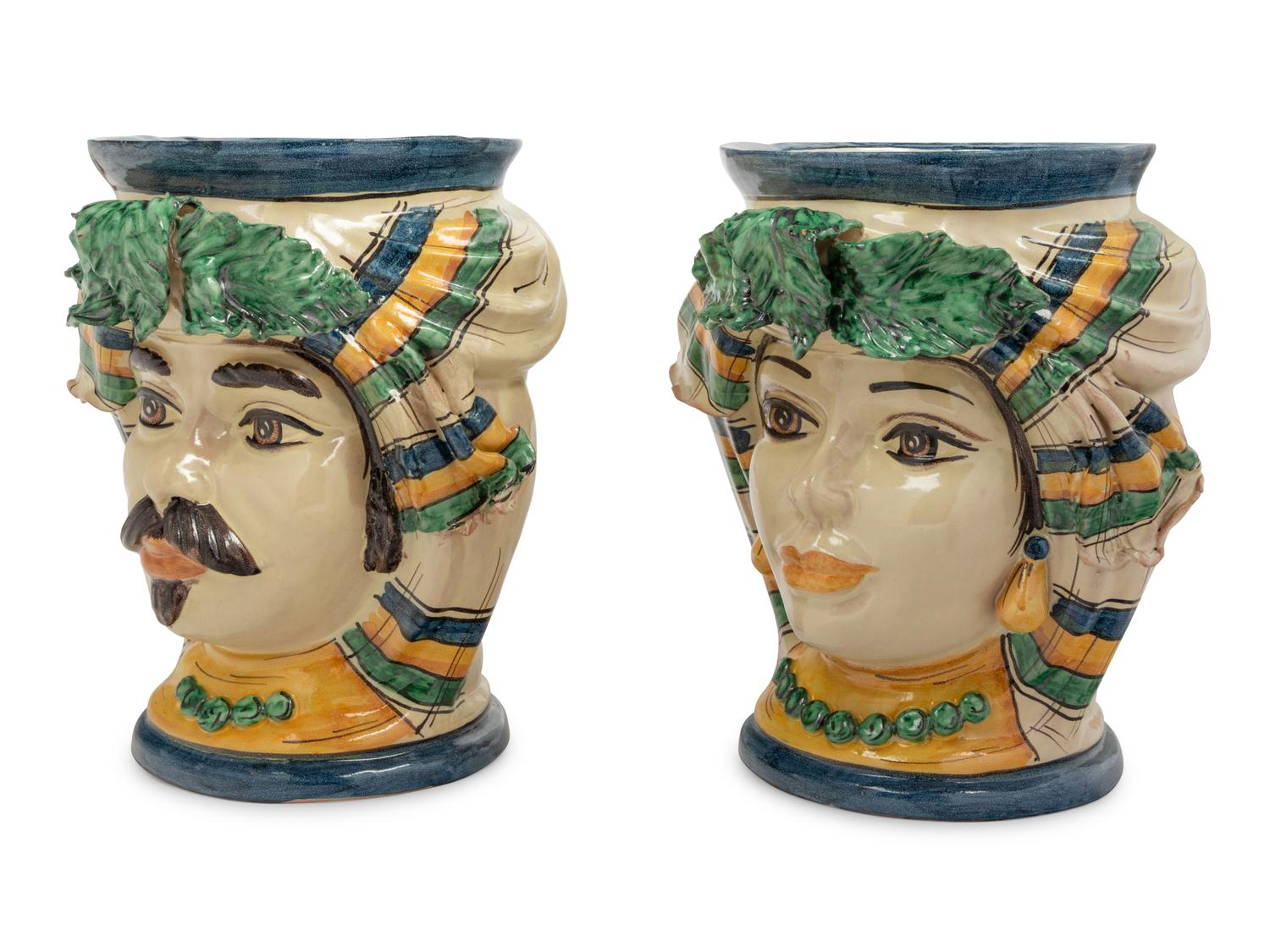 A Pair of Italian Polychrome Glazed Pottery Figural Vases