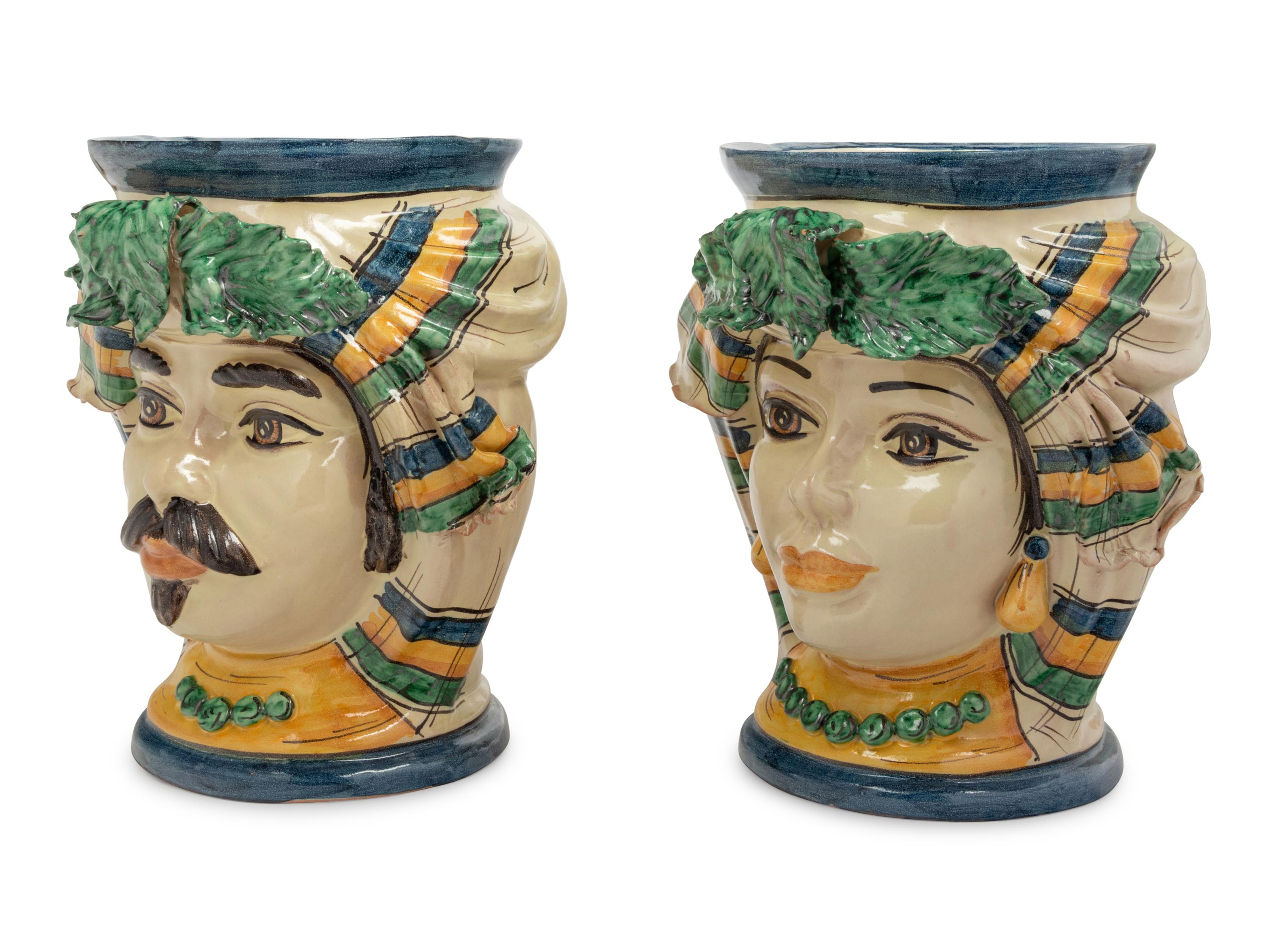 A Pair of Italian Polychrome Glazed Pottery Figural Vases