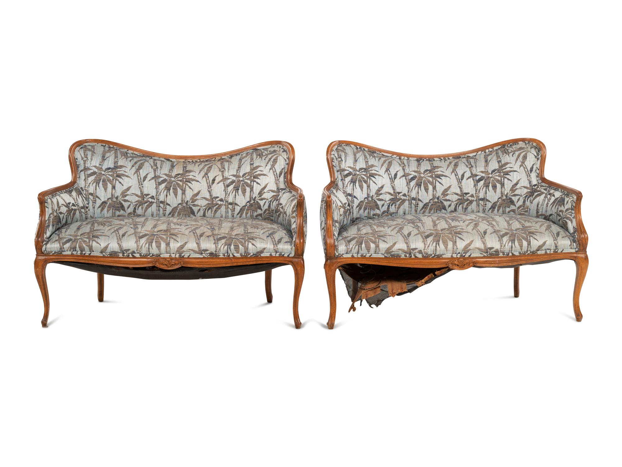 A Pair of Art Nouveau Style Walnut Settees