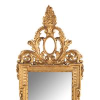 An Italian Baroque Style Giltwood Mirror