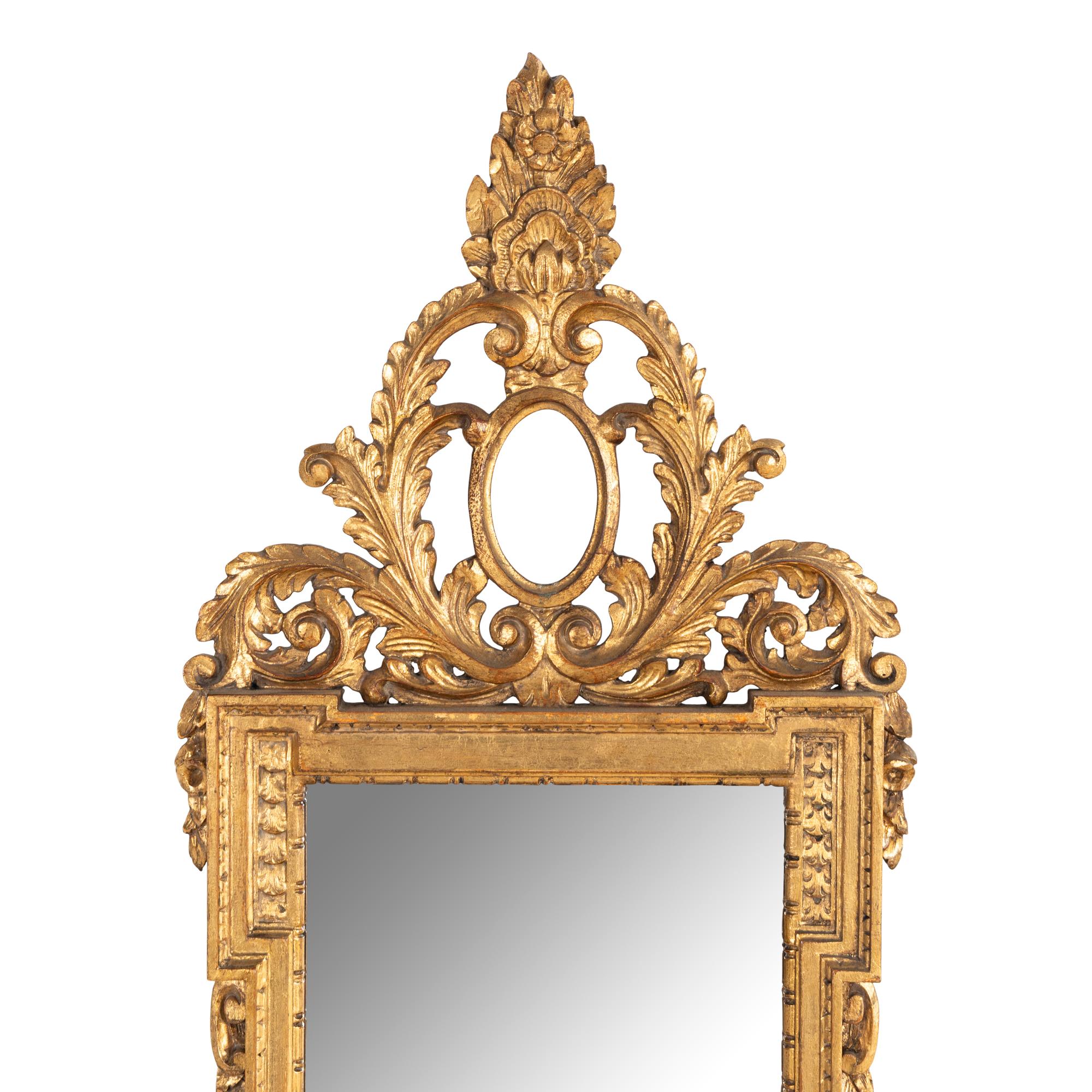 An Italian Baroque Style Giltwood Mirror