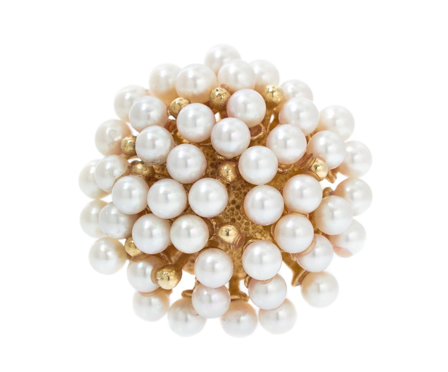 A 14 Karat Yellow Gold and Cultured Pearl Ring, 8.80 dwts.