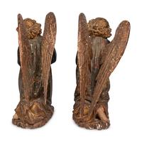 A Pair of Carved and Polychrome Decorated Figures of Kneeling Angels